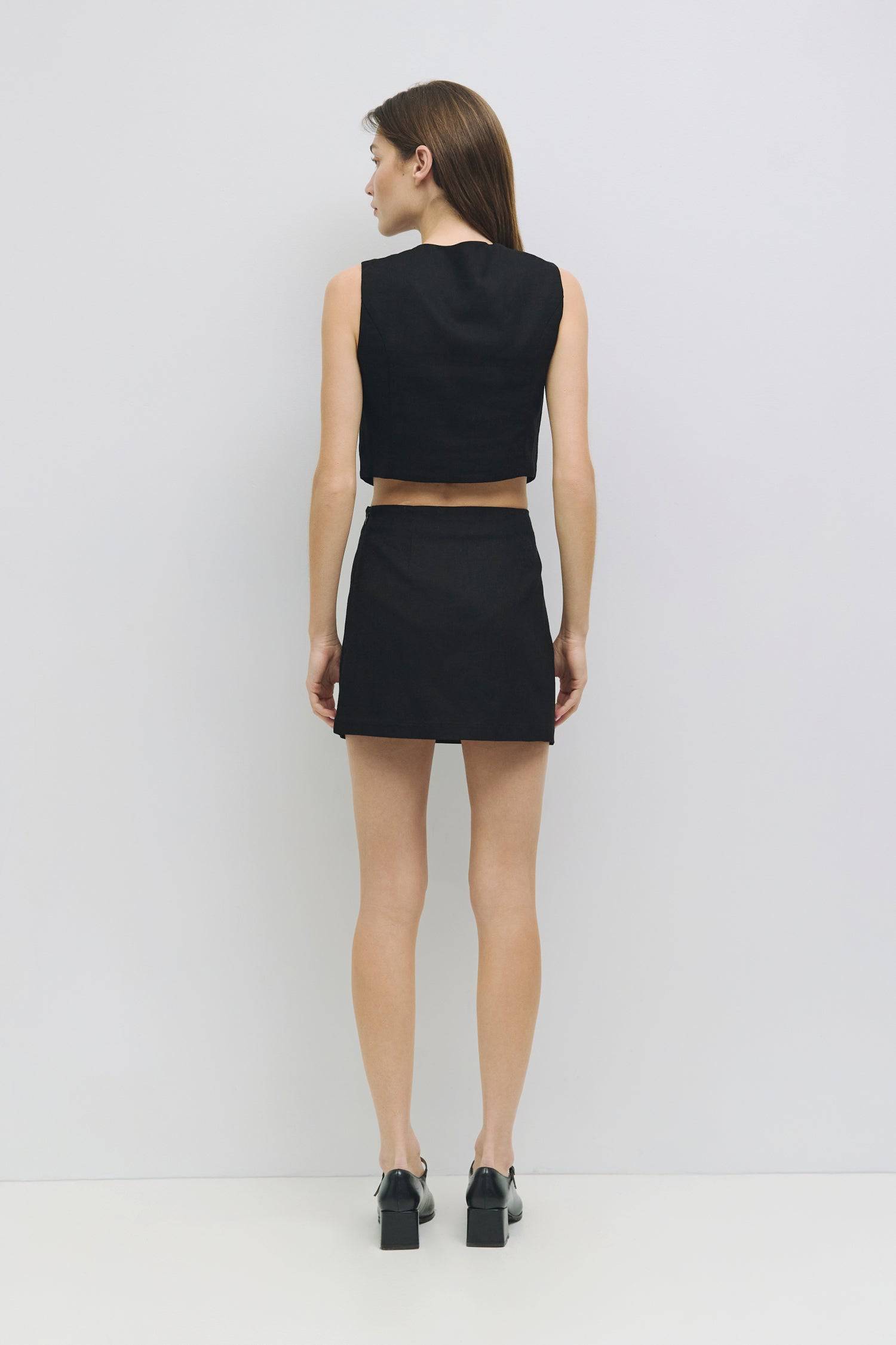 8954053951709, The Sterling Skirt, Bottoms, Mod Ref, adjustable,Black,Casual,cf-color-black,cf-color-oatmeal,cf-size-l,cf-size-m,cf-size-s,cf-size-xl,cf-size-xs,cf-vendor-all-row,cotton,Everyday,new,Oatmeal,Pocket,Pockets,Relaxed,Relaxed Fit,set,Sets,Skirt,Women's, Information The Sterling Skirt is a chic mini-length piece designed for a fitted silhouette, featuring dart details for a flattering fit. With a hidden side zipper with a hook-and-eye closure and a fully lined interior, this skirt pairs perfectly