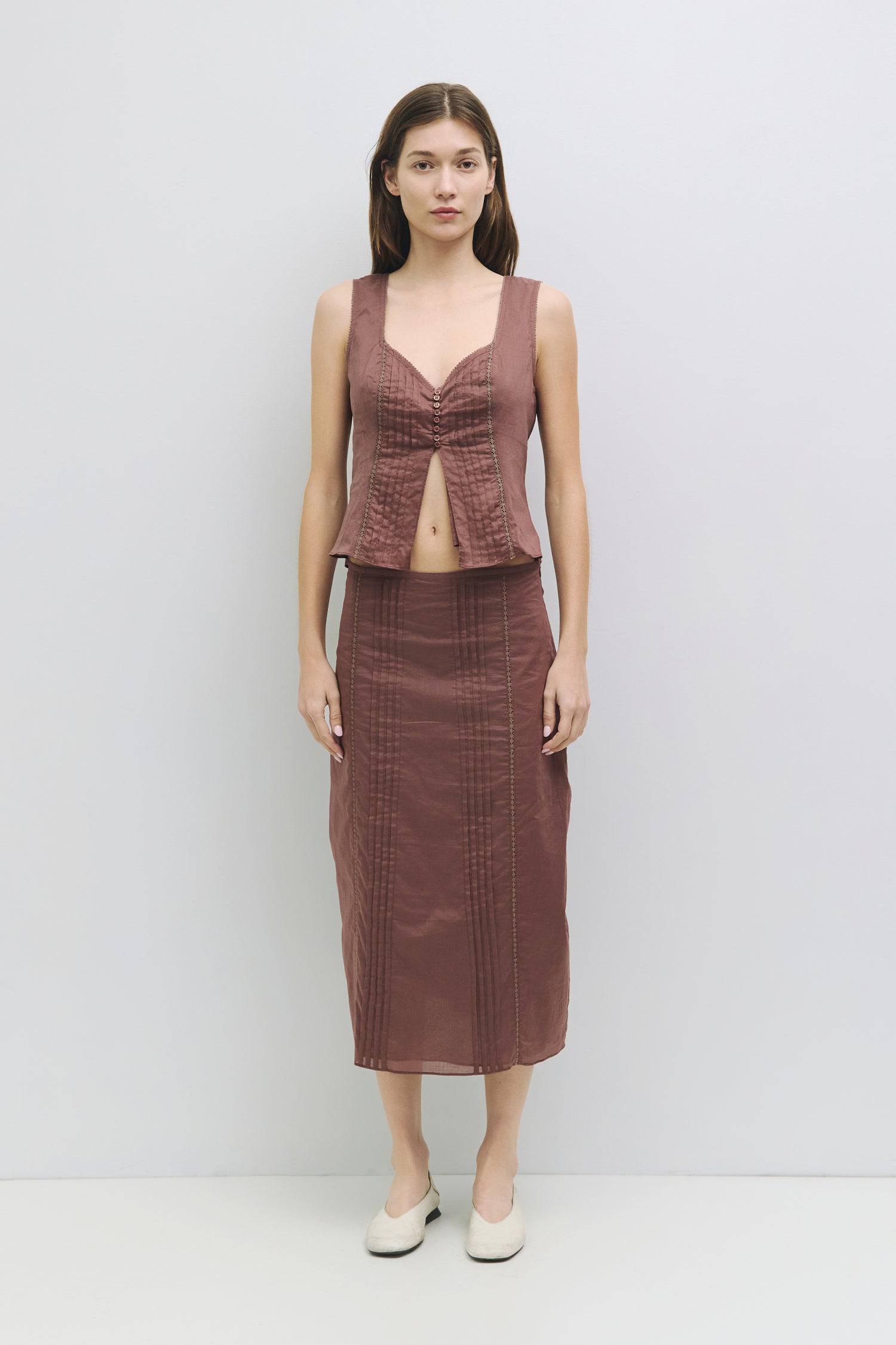 8954054181085, The Finley Skirt, Bottoms, Mod Ref, adjustable,allrow,cf-color-white,cf-size-l,cf-size-m,cf-size-s,cf-size-xl,cf-size-xs,cf-vendor-all-row,cotton,Everyday,Midi,midi length,Midi Skirt,new,set,Sets,Skirt,Spring,Summer,white,Women's, Information The Finley Skirt is a cotton midi skirt with front pleat and lace inset details for a subtle touch of texture. It is a fully lined piece with a hidden side zipper complemented by a hook-and-eye closure. Style it with The Finely Top (TR3890) for an easy y