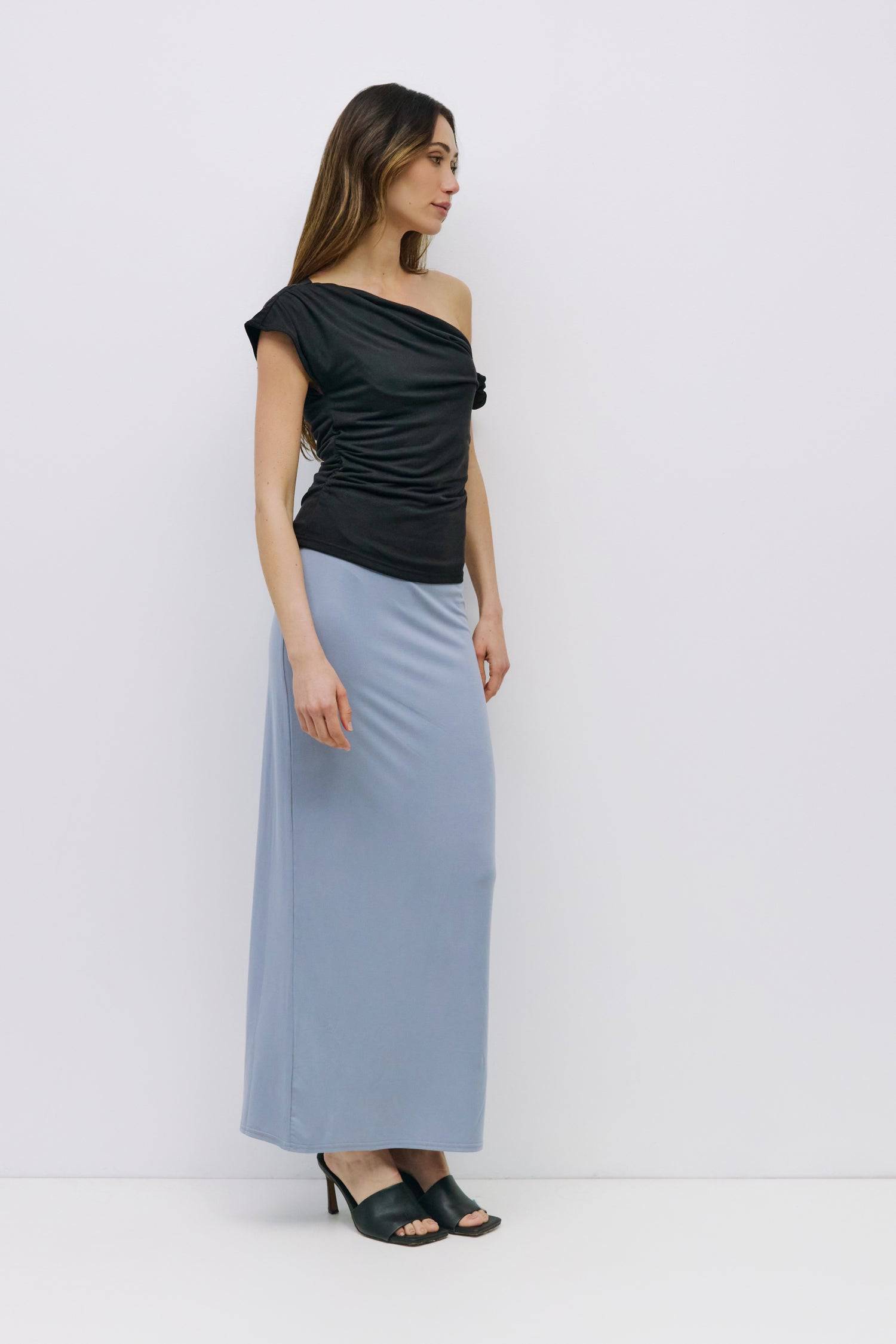 8983730487517, The Amal Skirt, Bottoms, Mod Ref, Black,Bottom,Bottoms,Casual,cf-color-black,cf-color-cream,cf-size-l,cf-size-m,cf-size-s,cf-vendor-mod-ref,Comfortable,Cotton,Cream,curve skirt,drawstring waist,Dress,Everyday,Form Fitting,Linen,linen-blend,maxi skirt,Midi Dress,midi length,new,Rib Knit,Ribbed,Sleeveless,Spring,Summer,womens, Information The Amal Skirt is a fitted, pull-on modal knit maxi skirt with a straight silhouette and a back vent for ease of movement. With an elasticized waistband and b