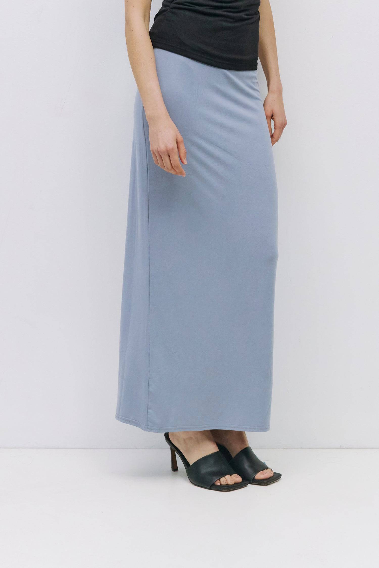 8983730487517, The Amal Skirt, Bottoms, Mod Ref, Black,Bottom,Bottoms,Casual,cf-color-black,cf-color-cream,cf-size-l,cf-size-m,cf-size-s,cf-vendor-mod-ref,Comfortable,Cotton,Cream,curve skirt,drawstring waist,Dress,Everyday,Form Fitting,Linen,linen-blend,maxi skirt,Midi Dress,midi length,new,Rib Knit,Ribbed,Sleeveless,Spring,Summer,womens, Information The Amal Skirt is a fitted, pull-on modal knit maxi skirt with a straight silhouette and a back vent for ease of movement. With an elasticized waistband and b