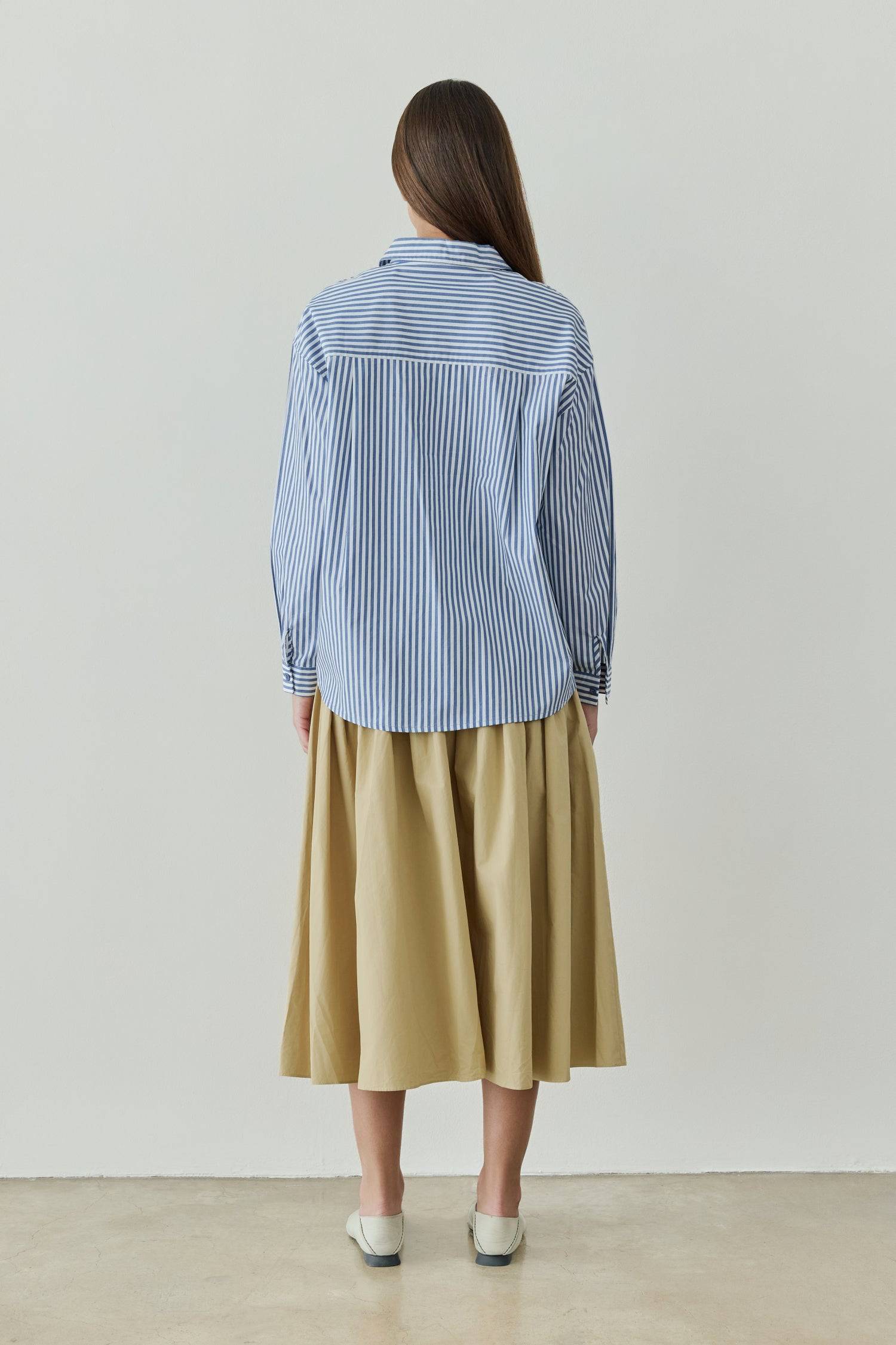 8302393393373, The Mariana Skirt, Bottoms, All Row, beige,Black,Bottom,Bottoms,Breathable,cf-color-black,cf-color-white,cf-size-l,cf-size-m,cf-size-s,cf-vendor-all-row,Comfortable,everyday,flowy,High Waist,Lime,Matching Set,Midi Skirt,POPLIN,Relaxed Fit,ruched,ruching,Semi-Formal,set,Sets,Skirt,spring,Summer,versatile,white,womens, Information The Mariana Skirt is an elevated midi skirt with wrap detailing at the waistline. It features a full, flowing design and an invisible back zipper for a seamless finis