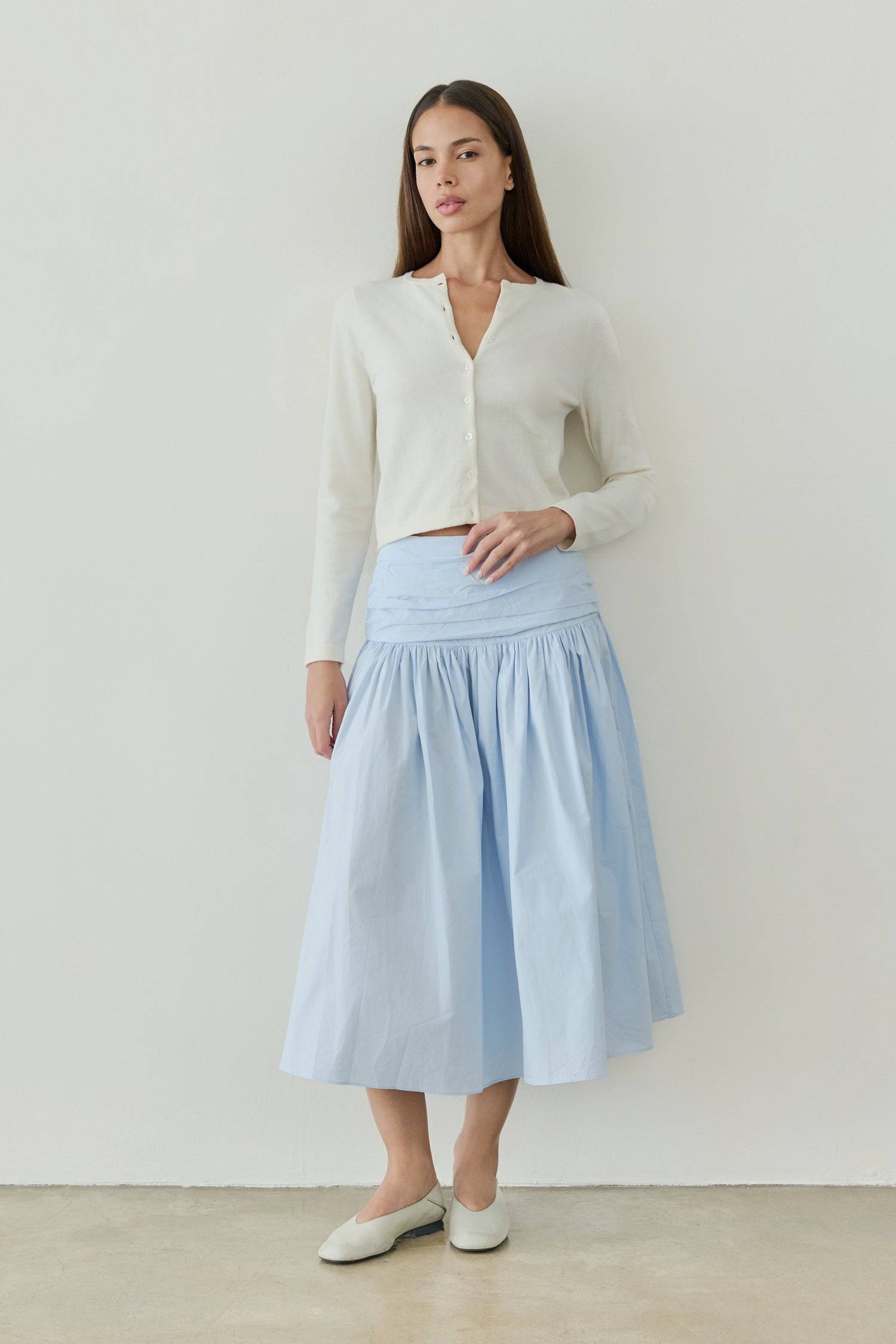 8302393393373, The Mariana Skirt, Bottoms, All Row, beige,Black,Bottom,Bottoms,Breathable,cf-color-black,cf-color-white,cf-size-l,cf-size-m,cf-size-s,cf-vendor-all-row,Comfortable,everyday,flowy,High Waist,Lime,Matching Set,Midi Skirt,POPLIN,Relaxed Fit,ruched,ruching,Semi-Formal,set,Sets,Skirt,spring,Summer,versatile,white,womens, Information The Mariana Skirt is an elevated midi skirt with wrap detailing at the waistline. It features a full, flowing design and an invisible back zipper for a seamless finis