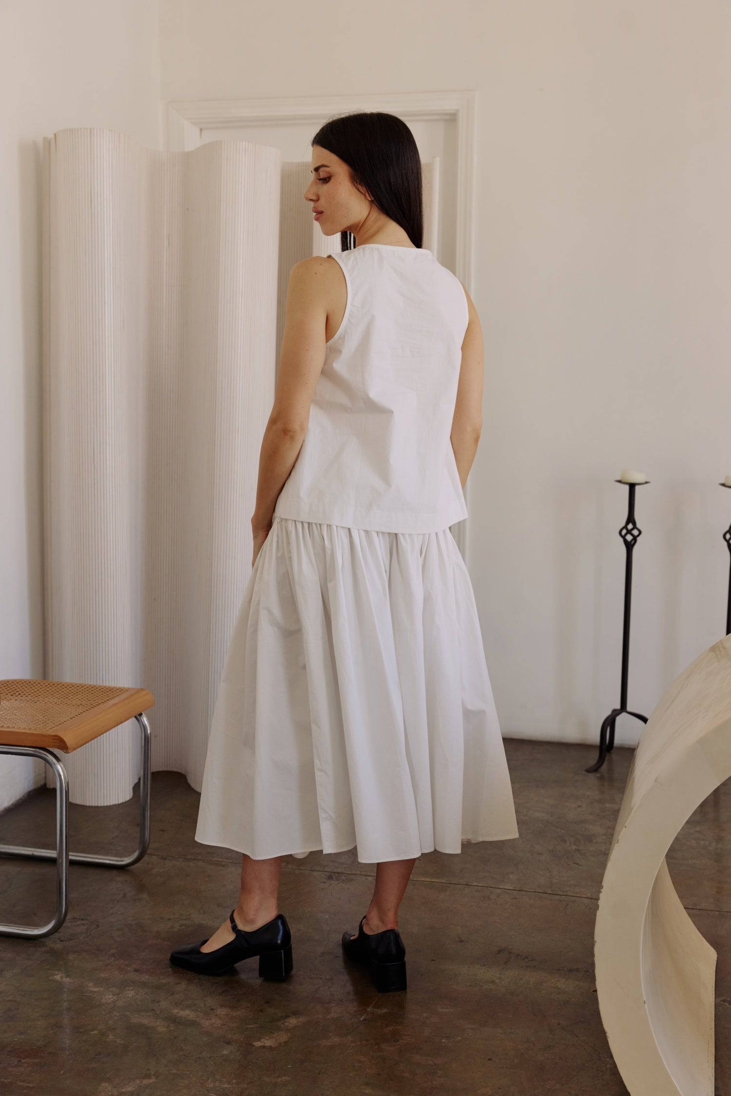 8302393393373, The Mariana Skirt, Bottoms, All Row, beige,Black,Bottom,Bottoms,Breathable,cf-color-black,cf-color-white,cf-size-l,cf-size-m,cf-size-s,cf-vendor-all-row,Comfortable,everyday,flowy,High Waist,Lime,Matching Set,Midi Skirt,POPLIN,Relaxed Fit,ruched,ruching,Semi-Formal,set,Sets,Skirt,spring,Summer,versatile,white,womens, Information The Mariana Skirt is an elevated midi skirt with wrap detailing at the waistline. It features a full, flowing design and an invisible back zipper for a seamless finis