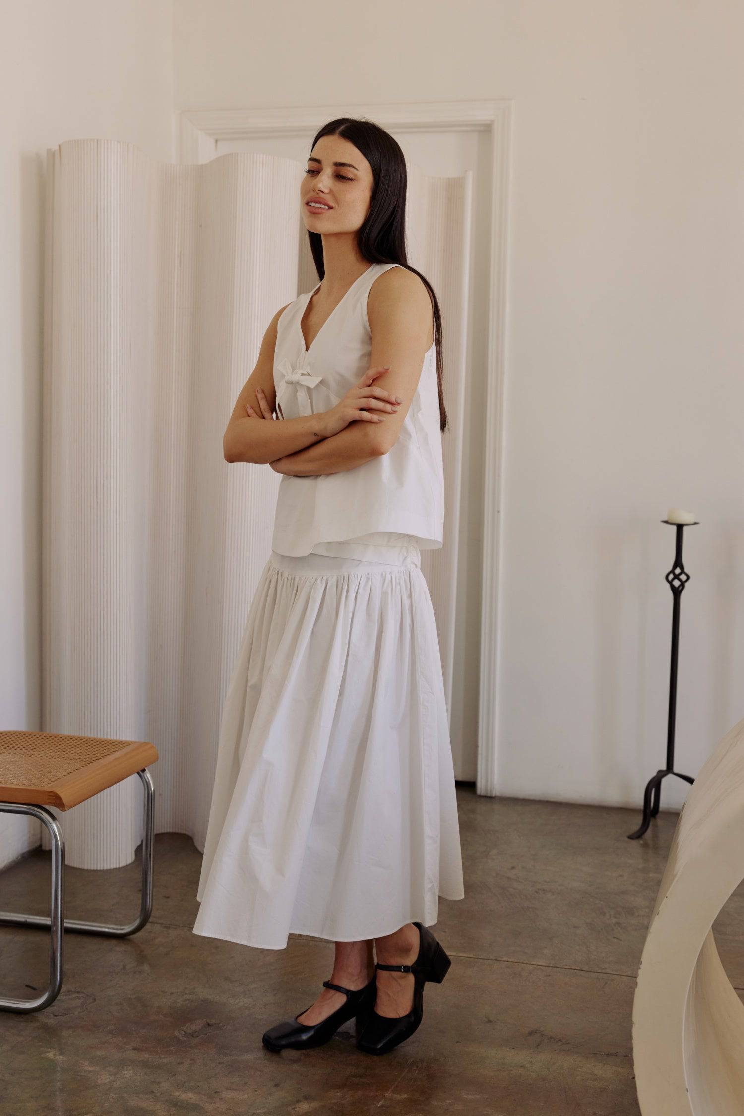 8302393393373, The Mariana Skirt, Bottoms, All Row, beige,Black,Bottom,Bottoms,Breathable,cf-color-black,cf-color-white,cf-size-l,cf-size-m,cf-size-s,cf-vendor-all-row,Comfortable,everyday,flowy,High Waist,Lime,Matching Set,Midi Skirt,POPLIN,Relaxed Fit,ruched,ruching,Semi-Formal,set,Sets,Skirt,spring,Summer,versatile,white,womens, Information The Mariana Skirt is an elevated midi skirt with wrap detailing at the waistline. It features a full, flowing design and an invisible back zipper for a seamless finis