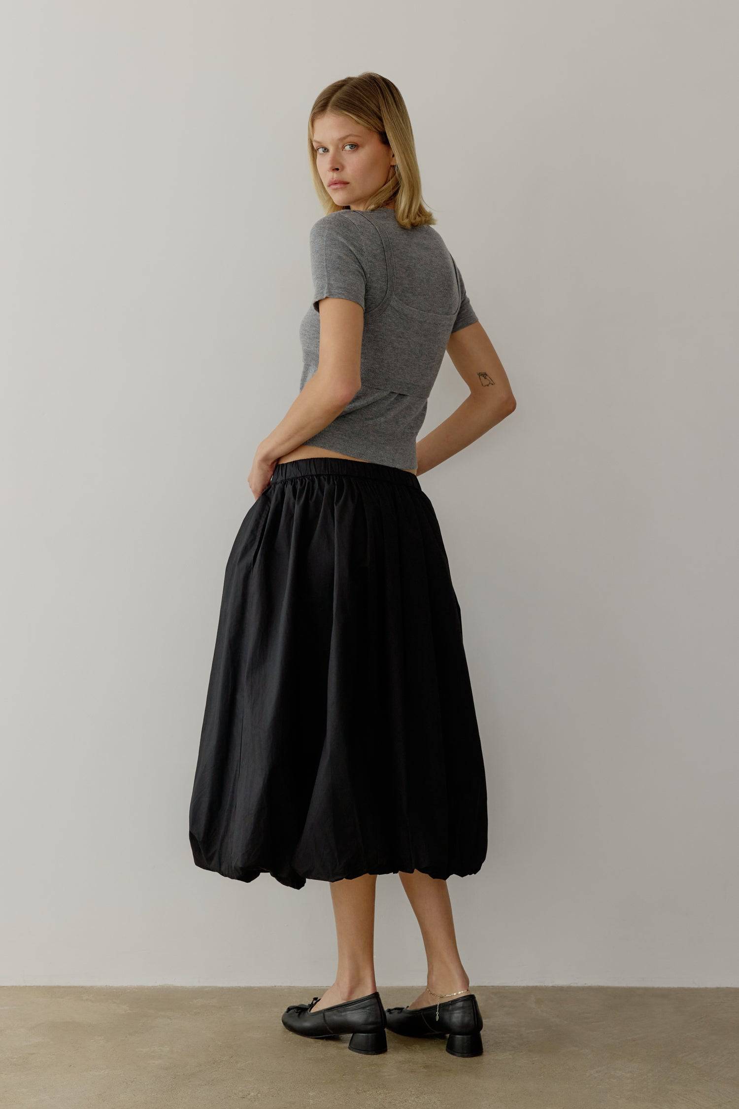 8466464997597, The Bella Skirt, Skirt, All Row, Black,Blue,Bottom,Bottoms,bubble,bubble skirt,cf-color-black,cf-color-natural,cf-size-l,cf-size-m,cf-size-s,Comfortable,Elastic,Elastic Waistband,everyday,flowy,ivory,Light Blue,matching,Midi Skirt,Mod Ref,Skirt,skirts,spring,Summer,womens, Information The Bella Skirt is a playful midi-length bubble skirt. It features an elasticated waist for a comfortable and adjustable fit. The length and bubble effect hem add volume and movement to the silhouette. Pair this