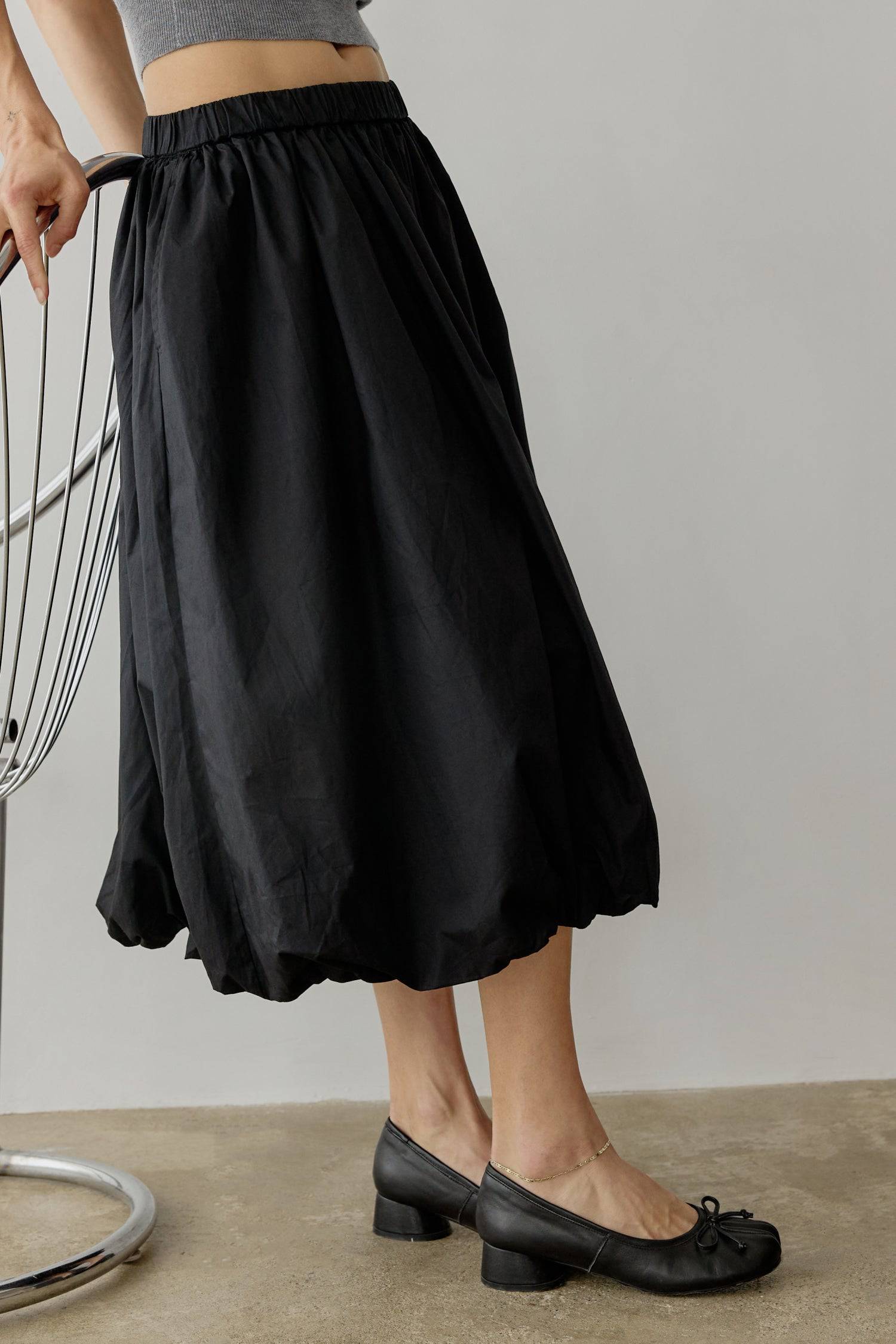 8466464997597, The Bella Skirt, Skirt, All Row, Black,Blue,Bottom,Bottoms,bubble,bubble skirt,cf-color-black,cf-color-natural,cf-size-l,cf-size-m,cf-size-s,Comfortable,Elastic,Elastic Waistband,everyday,flowy,ivory,Light Blue,matching,Midi Skirt,Mod Ref,Skirt,skirts,spring,Summer,womens, Information The Bella Skirt is a playful midi-length bubble skirt. It features an elasticated waist for a comfortable and adjustable fit. The length and bubble effect hem add volume and movement to the silhouette. Pair this