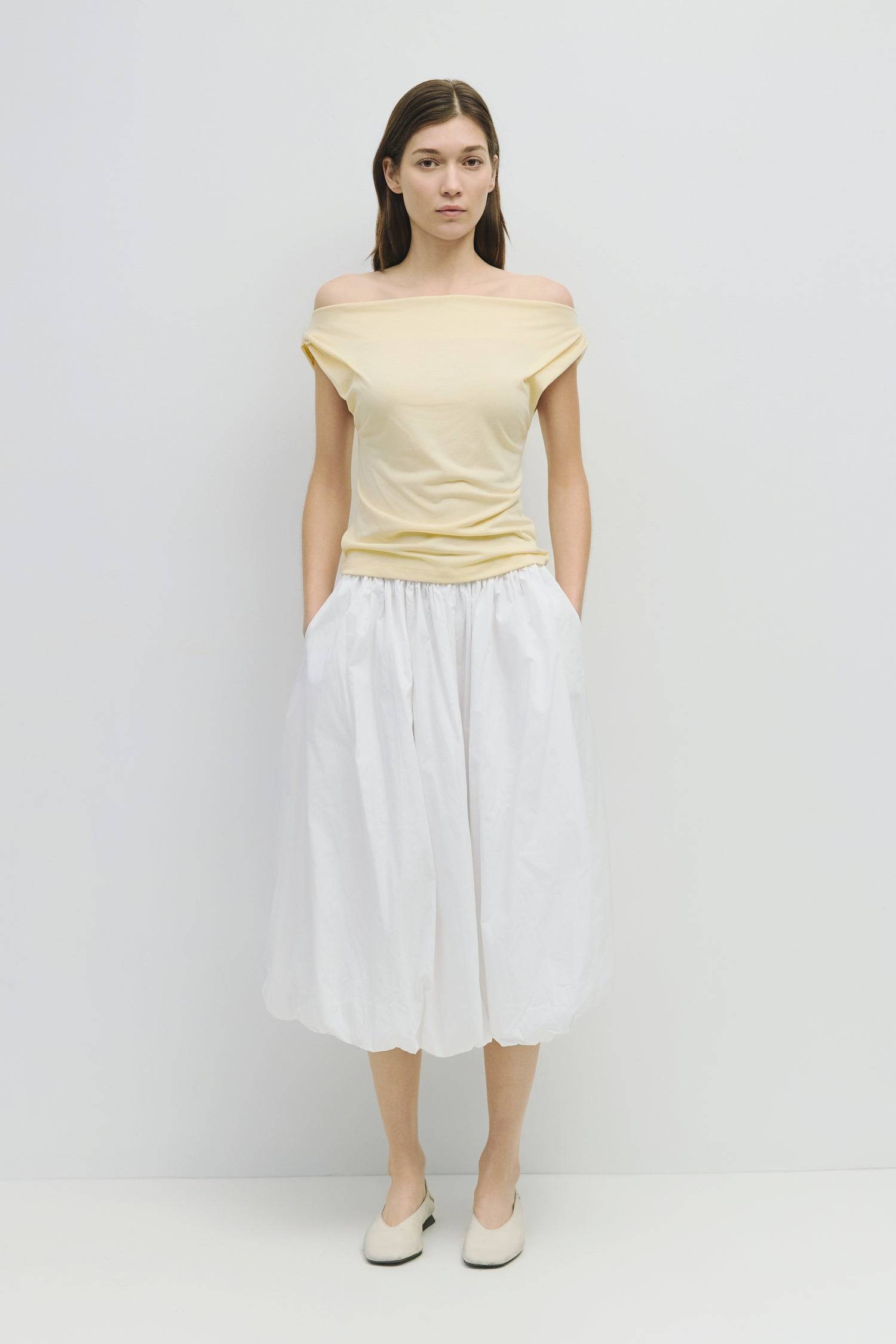 8466464997597, The Bella Skirt, Skirt, All Row, Black,Blue,Bottom,Bottoms,bubble,bubble skirt,cf-color-black,cf-color-natural,cf-size-l,cf-size-m,cf-size-s,Comfortable,Elastic,Elastic Waistband,everyday,flowy,ivory,Light Blue,matching,Midi Skirt,Mod Ref,Skirt,skirts,spring,Summer,womens, Information The Bella Skirt is a playful midi-length bubble skirt. It features an elasticated waist for a comfortable and adjustable fit. The length and bubble effect hem add volume and movement to the silhouette. Pair this