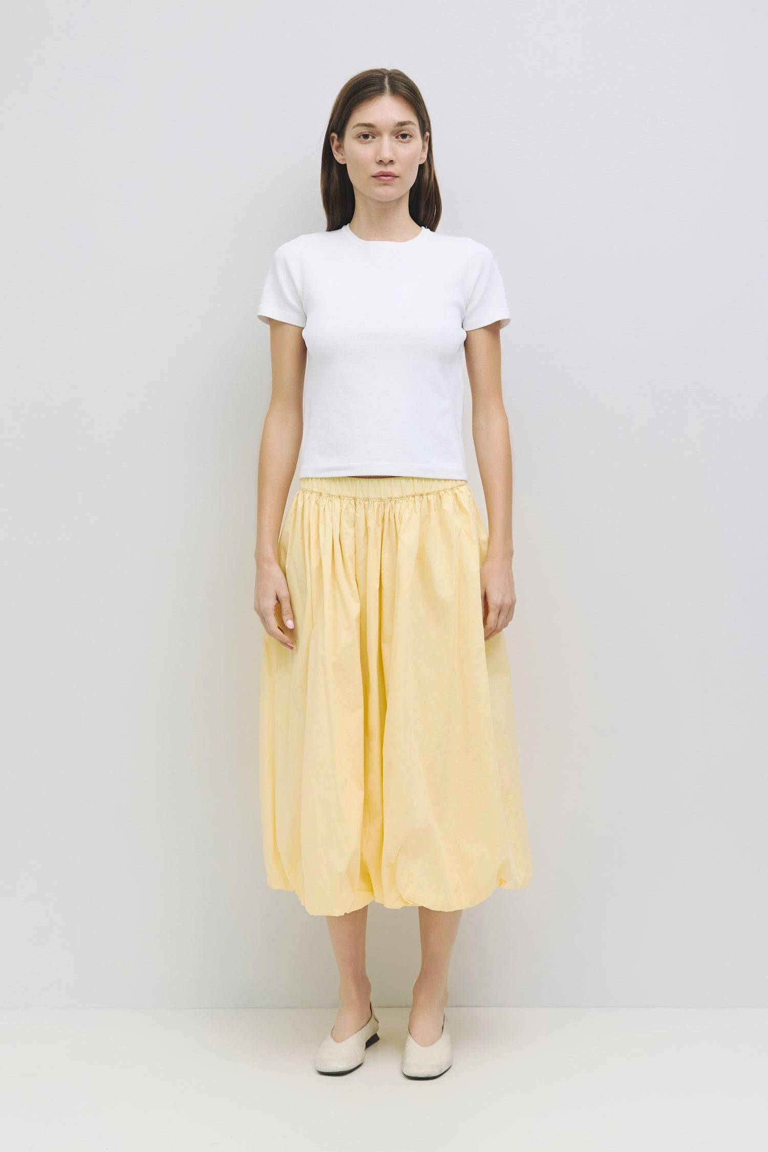 8466464997597, The Bella Skirt, Skirt, All Row, Black,Blue,Bottom,Bottoms,bubble,bubble skirt,cf-color-black,cf-color-natural,cf-size-l,cf-size-m,cf-size-s,Comfortable,Elastic,Elastic Waistband,everyday,flowy,ivory,Light Blue,matching,Midi Skirt,Mod Ref,Skirt,skirts,spring,Summer,womens, Information The Bella Skirt is a playful midi-length bubble skirt. It features an elasticated waist for a comfortable and adjustable fit. The length and bubble effect hem add volume and movement to the silhouette. Pair this