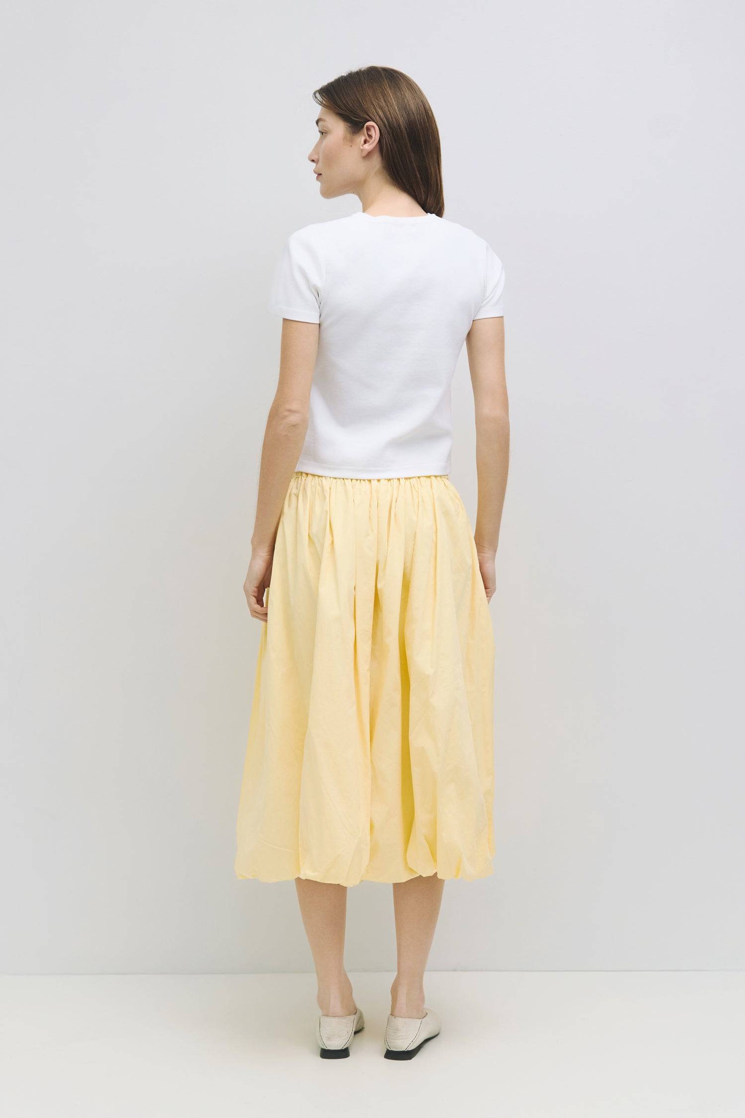 8466464997597, The Bella Skirt, Skirt, All Row, Black,Blue,Bottom,Bottoms,bubble,bubble skirt,cf-color-black,cf-color-natural,cf-size-l,cf-size-m,cf-size-s,Comfortable,Elastic,Elastic Waistband,everyday,flowy,ivory,Light Blue,matching,Midi Skirt,Mod Ref,Skirt,skirts,spring,Summer,womens, Information The Bella Skirt is a playful midi-length bubble skirt. It features an elasticated waist for a comfortable and adjustable fit. The length and bubble effect hem add volume and movement to the silhouette. Pair this