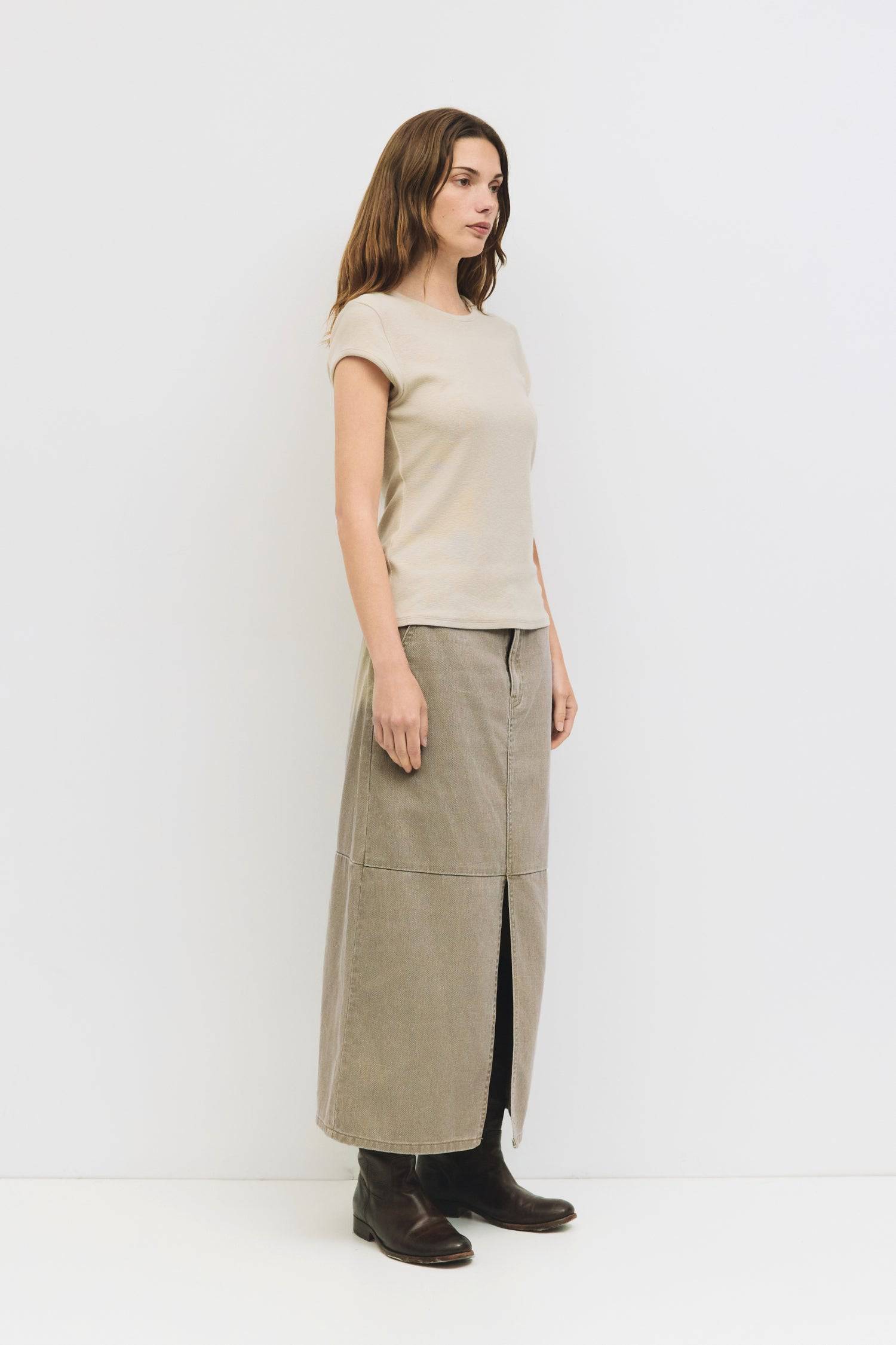 9045707784413, The Ryder Skirt, Bottoms, Mod Ref, a line,allrow,brown,Casual,cf-color-brown,cf-color-khaki,cf-color-white,cf-size-l,cf-size-m,cf-size-s,cf-size-xl,cf-size-xs,cf-vendor-all-row,cotton,Denim,denim skirt,Everyday,Feminine,front slit,Khaki,Midi,Midi Skirt,new,Pocket,Pockets,Relaxed,side pockets,Skirt,Women's, Information The Ryder Skirt is a midweight washed denim pencil skirt with a low-mid rise and a front slit for ease of movement. Its midi length and clean zipper closure create a timeless, v