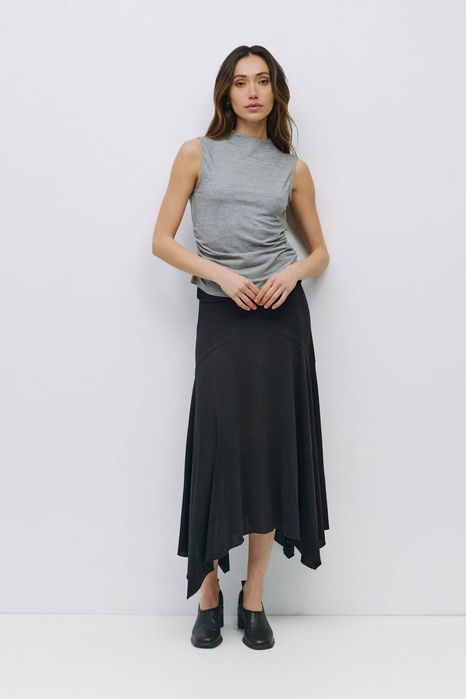 8983698866397, The Genesis Top, Tops, All Row, adjustable,adjustable ties,Black,brown,Casual,cf-color-brown,cf-color-cream,cf-color-olive,cf-size-l,cf-size-m,cf-size-s,cf-size-xl,cf-vendor-all-row,Comfortable,Cream,Crew Neckline,Everyday,flowy,Front Tie,Layers,Lightweight,Minimal,new,Relaxed,Relaxed Fit,Soft,Spring,Top,Trendy,Women's, Information The Genesis Top is a sleeveless mock neck tank featuring shirring detail at the waist for a flattering fit. Its meet-and-greet length makes it perfect for pairing