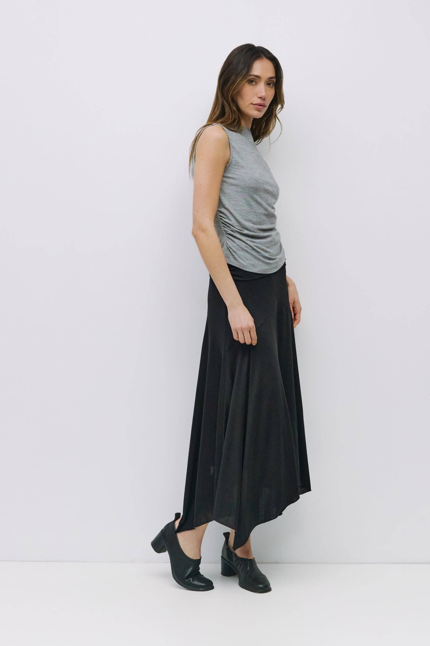 8983698866397, The Genesis Top, Tops, All Row, adjustable,adjustable ties,Black,brown,Casual,cf-color-brown,cf-color-cream,cf-color-olive,cf-size-l,cf-size-m,cf-size-s,cf-size-xl,cf-vendor-all-row,Comfortable,Cream,Crew Neckline,Everyday,flowy,Front Tie,Layers,Lightweight,Minimal,new,Relaxed,Relaxed Fit,Soft,Spring,Top,Trendy,Women's, Information The Genesis Top is a sleeveless mock neck tank featuring shirring detail at the waist for a flattering fit. Its meet-and-greet length makes it perfect for pairing