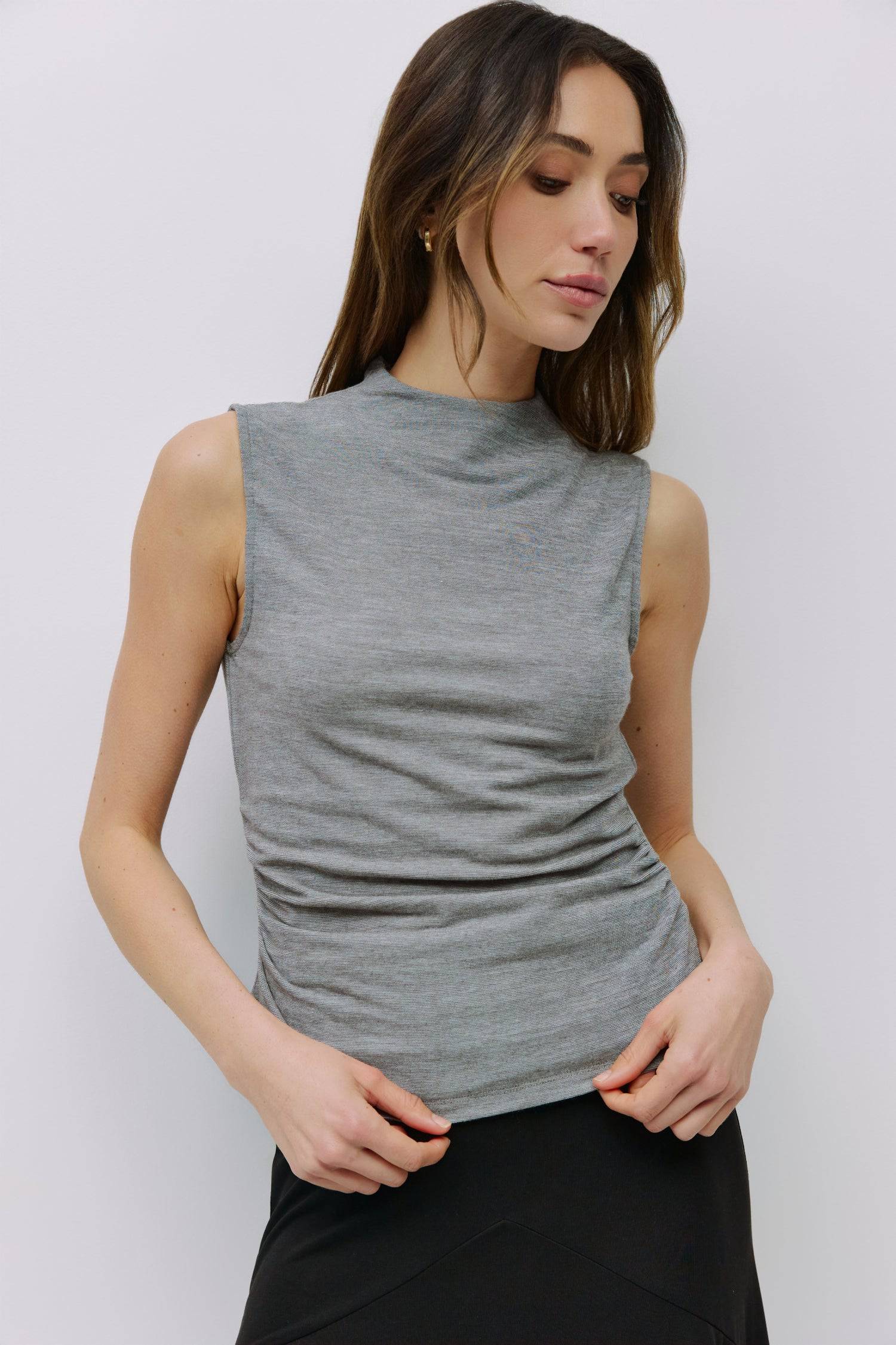 8983698866397, The Genesis Top, Tops, All Row, adjustable,adjustable ties,Black,brown,Casual,cf-color-brown,cf-color-cream,cf-color-olive,cf-size-l,cf-size-m,cf-size-s,cf-size-xl,cf-vendor-all-row,Comfortable,Cream,Crew Neckline,Everyday,flowy,Front Tie,Layers,Lightweight,Minimal,new,Relaxed,Relaxed Fit,Soft,Spring,Top,Trendy,Women's, Information The Genesis Top is a sleeveless mock neck tank featuring shirring detail at the waist for a flattering fit. Its meet-and-greet length makes it perfect for pairing