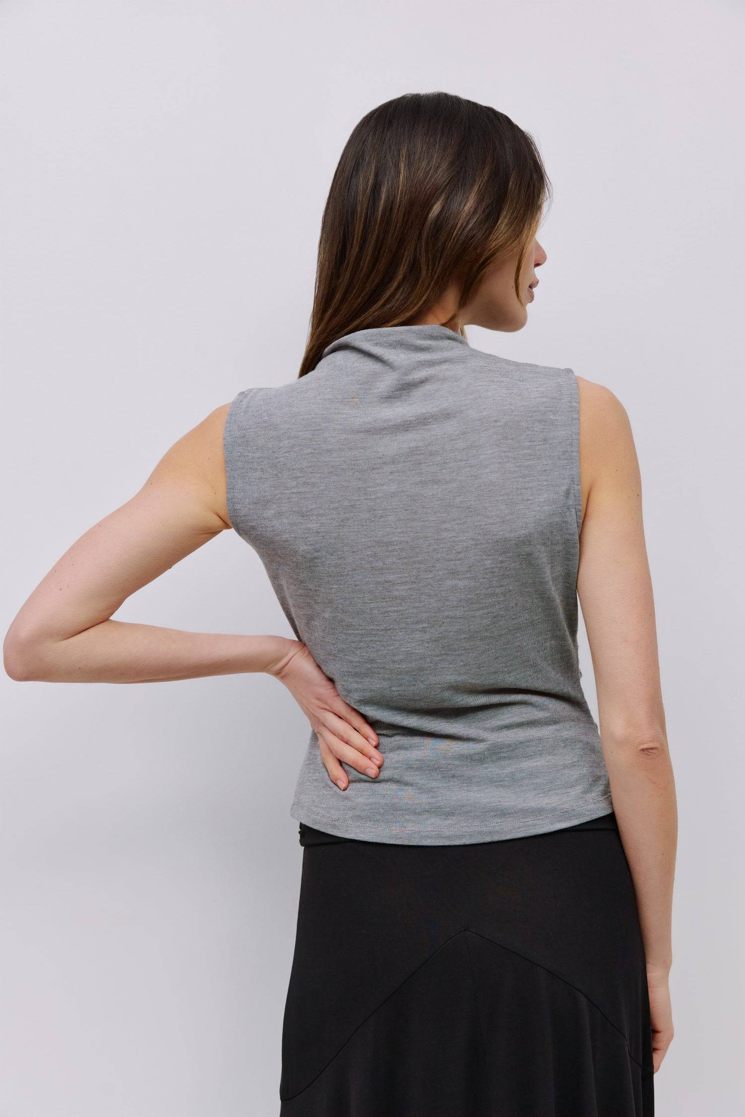 8983698866397, The Genesis Top, Tops, All Row, adjustable,adjustable ties,Black,brown,Casual,cf-color-brown,cf-color-cream,cf-color-olive,cf-size-l,cf-size-m,cf-size-s,cf-size-xl,cf-vendor-all-row,Comfortable,Cream,Crew Neckline,Everyday,flowy,Front Tie,Layers,Lightweight,Minimal,new,Relaxed,Relaxed Fit,Soft,Spring,Top,Trendy,Women's, Information The Genesis Top is a sleeveless mock neck tank featuring shirring detail at the waist for a flattering fit. Its meet-and-greet length makes it perfect for pairing