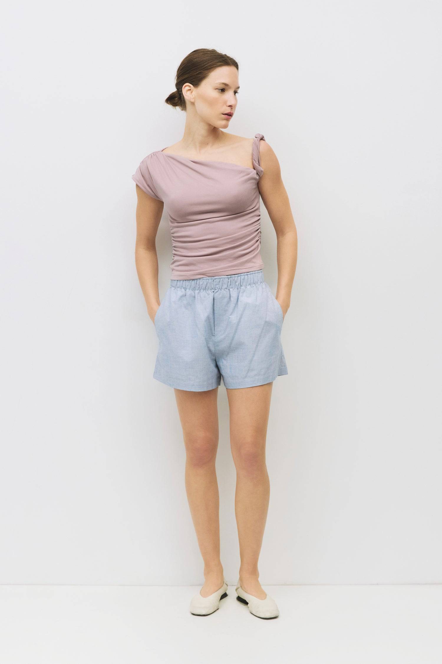 8983700013277, The Itria Top, Tops, All Row, All Row,allrow,beige,Black,Casual,cf-color-beige,cf-color-black,cf-color-white,cf-size-l,cf-size-m,cf-size-s,cf-vendor-all-row,Comfortable,Cozy,final-sale,finalsale,flattering,knit,new,off shoulder,sale,set,Sets,Short Sleeve,Spring,Summer,Twist,Women's,womens top, Information The Itria Top is a fitted cupro knit top with a single twisted shoulder strap and an asymmetrical neckline. Crafted from buttery-soft knit fabric, it combines comfort with a modern, flatteri