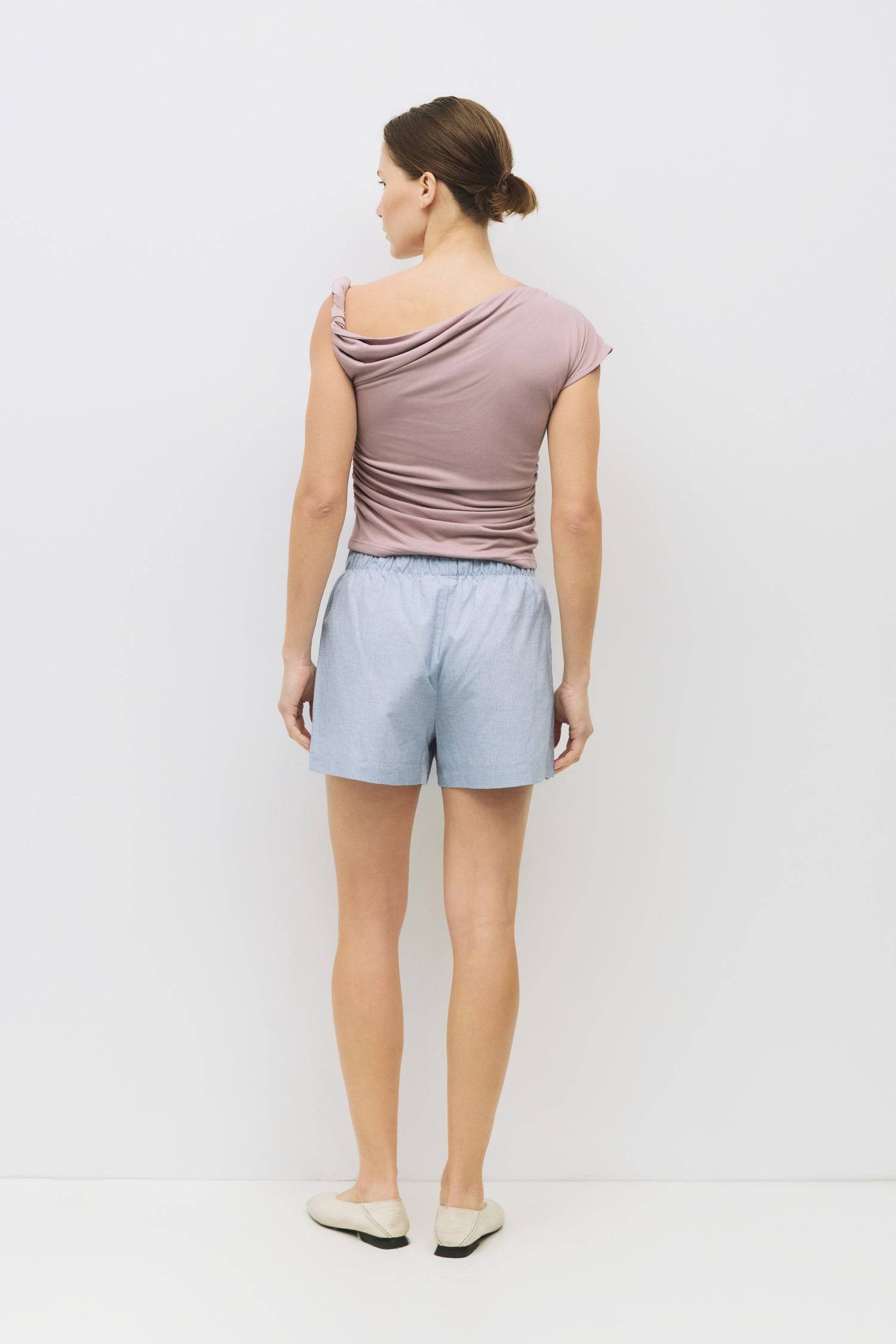 8983700013277, The Itria Top, Tops, All Row, All Row,allrow,beige,Black,Casual,cf-color-beige,cf-color-black,cf-color-white,cf-size-l,cf-size-m,cf-size-s,cf-vendor-all-row,Comfortable,Cozy,final-sale,finalsale,flattering,knit,new,off shoulder,sale,set,Sets,Short Sleeve,Spring,Summer,Twist,Women's,womens top, Information The Itria Top is a fitted cupro knit top with a single twisted shoulder strap and an asymmetrical neckline. Crafted from buttery-soft knit fabric, it combines comfort with a modern, flatteri