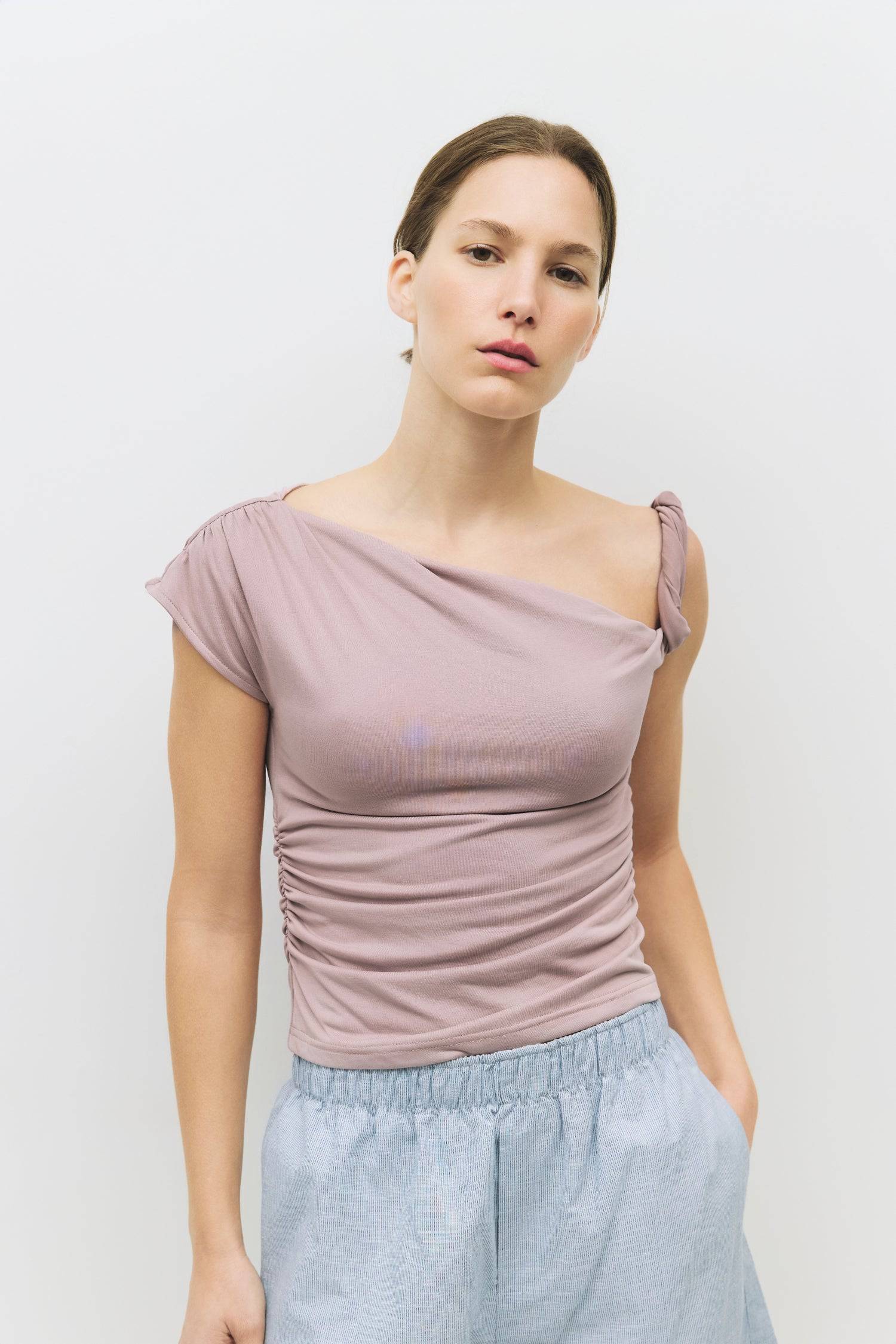 8983700013277, The Itria Top, Tops, All Row, All Row,allrow,beige,Black,Casual,cf-color-beige,cf-color-black,cf-color-white,cf-size-l,cf-size-m,cf-size-s,cf-vendor-all-row,Comfortable,Cozy,final-sale,finalsale,flattering,knit,new,off shoulder,sale,set,Sets,Short Sleeve,Spring,Summer,Twist,Women's,womens top, Information The Itria Top is a fitted cupro knit top with a single twisted shoulder strap and an asymmetrical neckline. Crafted from buttery-soft knit fabric, it combines comfort with a modern, flatteri