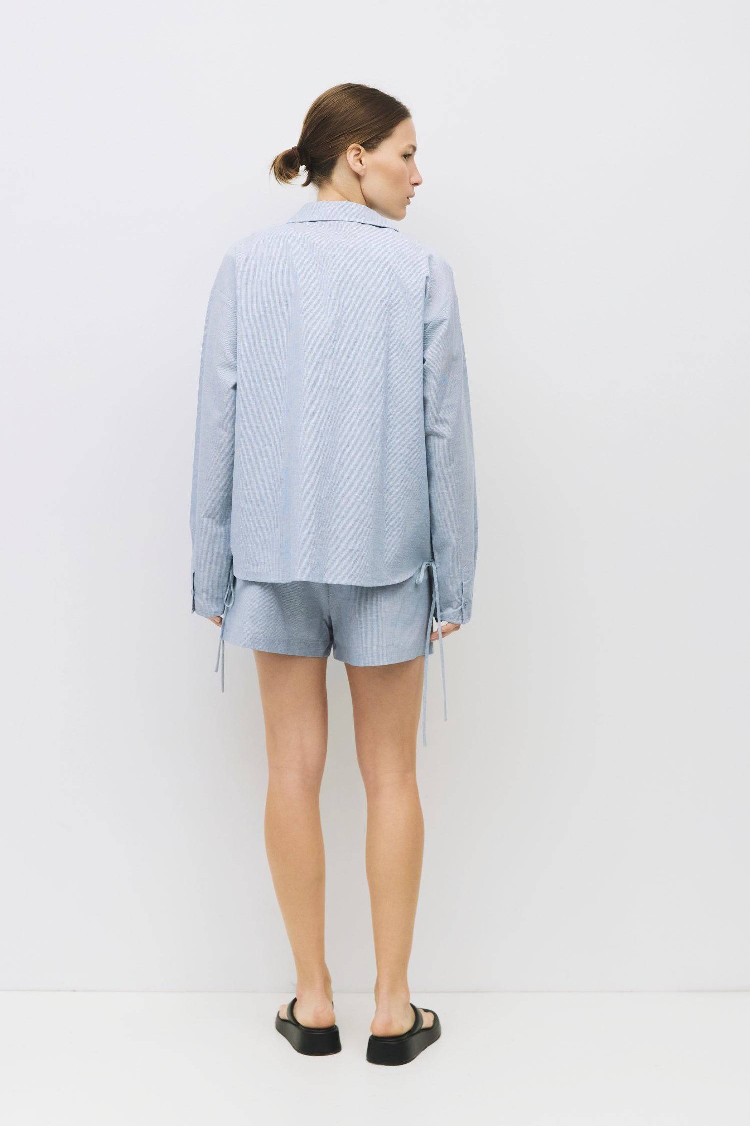 8993040138461, The Jacqueline Top, Tops, All Row, adjustable ties,All Row,allrow,beige,Blue,Button,Button down,Button Down Shirt,Button Front,Button Up,buttonup,Casual,cf-color-beige,cf-color-blue,cf-color-light-beige,cf-color-light-blue,cf-color-lightblue,cf-size-l,cf-size-m,cf-size-s,cf-vendor-all-row,Collared Top,light beige,Light Blue,Lightblue,Long Sleeve,Long Sleeve Top,Matching Set,new,Relaxed,Relaxed Fit,set,Sets,Spring,Women's,womens top, Information The Jacqueline Top is a striped collared shirt w