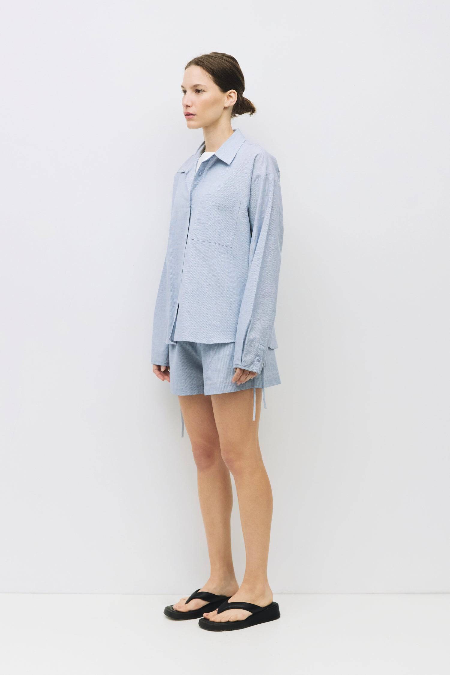 8993040138461, The Jacqueline Top, Tops, All Row, adjustable ties,All Row,allrow,beige,Blue,Button,Button down,Button Down Shirt,Button Front,Button Up,buttonup,Casual,cf-color-beige,cf-color-blue,cf-color-light-beige,cf-color-light-blue,cf-color-lightblue,cf-size-l,cf-size-m,cf-size-s,cf-vendor-all-row,Collared Top,light beige,Light Blue,Lightblue,Long Sleeve,Long Sleeve Top,Matching Set,new,Relaxed,Relaxed Fit,set,Sets,Spring,Women's,womens top, Information The Jacqueline Top is a striped collared shirt w