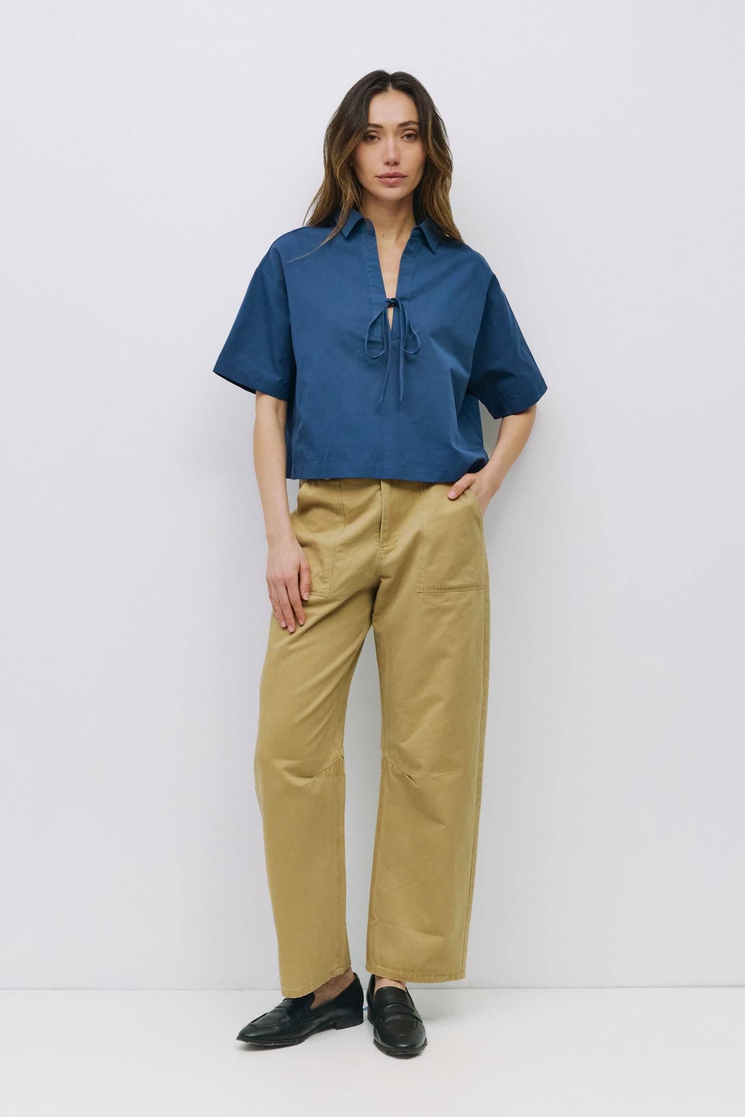 9023660294365, The Dawson Top, Tops, All Row, All Row,allrow,beige,Black,Casual,cf-color-beige,cf-color-black,cf-color-white,cf-size-l,cf-size-m,cf-size-s,cf-vendor-all-row,Comfortable,Cozy,flattering,knit,new,off shoulder,set,Sets,Short Sleeve,Spring,Summer,Twist,Women's,womens top, Information The Dawson Top is a boxy-fit poplin blouse with a collared neckline and a playful tie front detail at the bottom of the neck. The mid-length sleeves and side slits offer a relaxed, contemporary look in soft, midweig