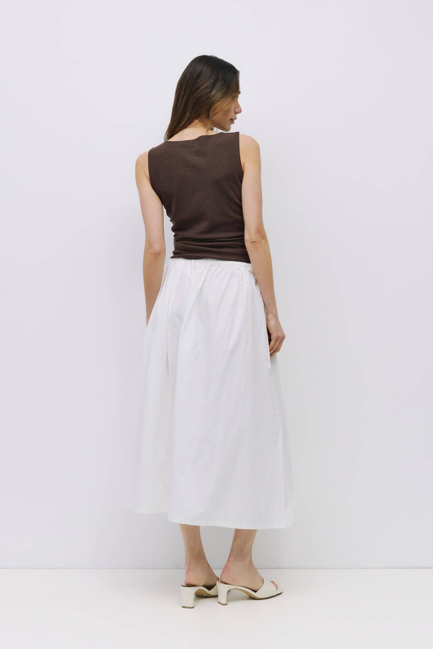 9023159927005, The Jordyn Top, Tops, All Row, Blue,boat neck,boat neckline,Bone,brown,Casual,cf-color-brown,cf-size-l,cf-size-m,cf-size-s,cf-size-xl,cf-vendor-all-row,cinched,Cinched Waist,Comfortable,Cotton,Cream,Crew Neckline,Everyday,Form Fitting,Layers,Light Blue,Minimal,new,Sleeveless,Soft,Spring,Summer,Top,Transitional,Trendy,Women's, Information The Jordyn Top is a form-fitting sleeveless tank crafted from a soft midweight knit. Designed with a boat neckline and side ruching at the waist for a subtle