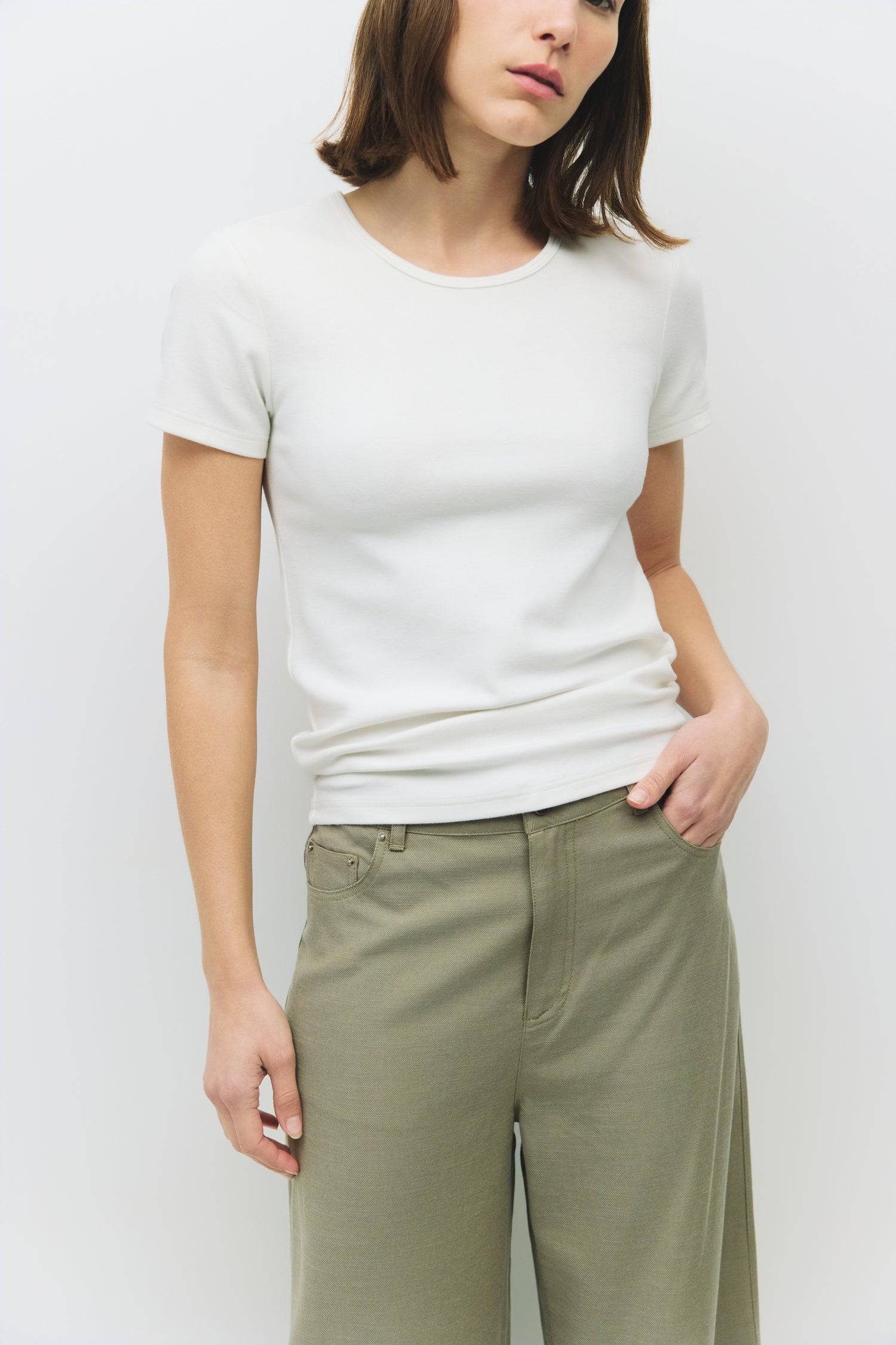 8994154250461, The Frida Top, Tops, All Row, back tie,Black,Blue,cf-color-blue,cf-color-lightblue,cf-color-white,cf-size-l,cf-vendor-all-row,Comfort,Comfortable,Crew Neck,Crew Neckline,Feminine,Form Fitting,Light Blue,new,Short Sleeve,Spring,Tops,versatile,white,Womens,womens top, Information The Frida Top is a form-fitting short sleeve knit made from soft, medium-weight fabric for a comfortable, tailored look. With a simple neck binding detail, it’s a versatile piece that pairs easily with both casual and