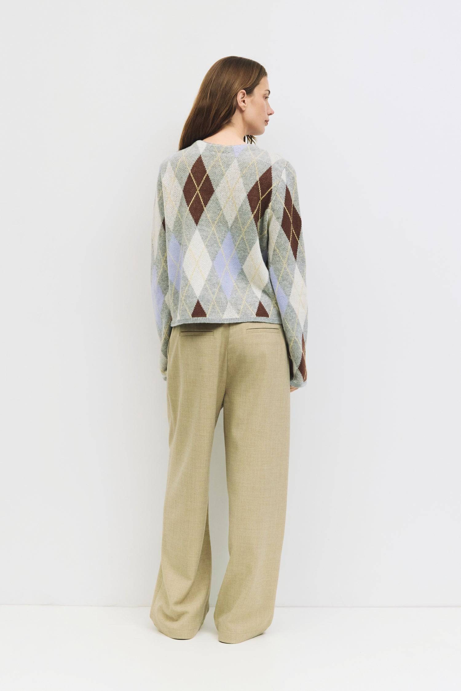 9084469608669, The Gayle Cardigan, Outerwear, Mod Ref, Acrylic,Cardigan,Casual,cf-color-grey,cf-color-sage,cf-size-l,cf-size-m,cf-size-s,cf-size-xl,cf-size-xs,cf-vendor-mod-ref,crewneck,Everyday,fall,Grey,Heather Grey,Long Sleeve,Mod Ref,modref,new,Pullover,Relaxed,Relaxed Fit,Sweater,Transitional,Women's,Wool,wool blend, Information The Gayle Cardigan is a relaxed-fit knit featuring a classic argyle design. It has a crewneck, long sleeves, and a front button closure. Made from midweight knit, it’s a timele