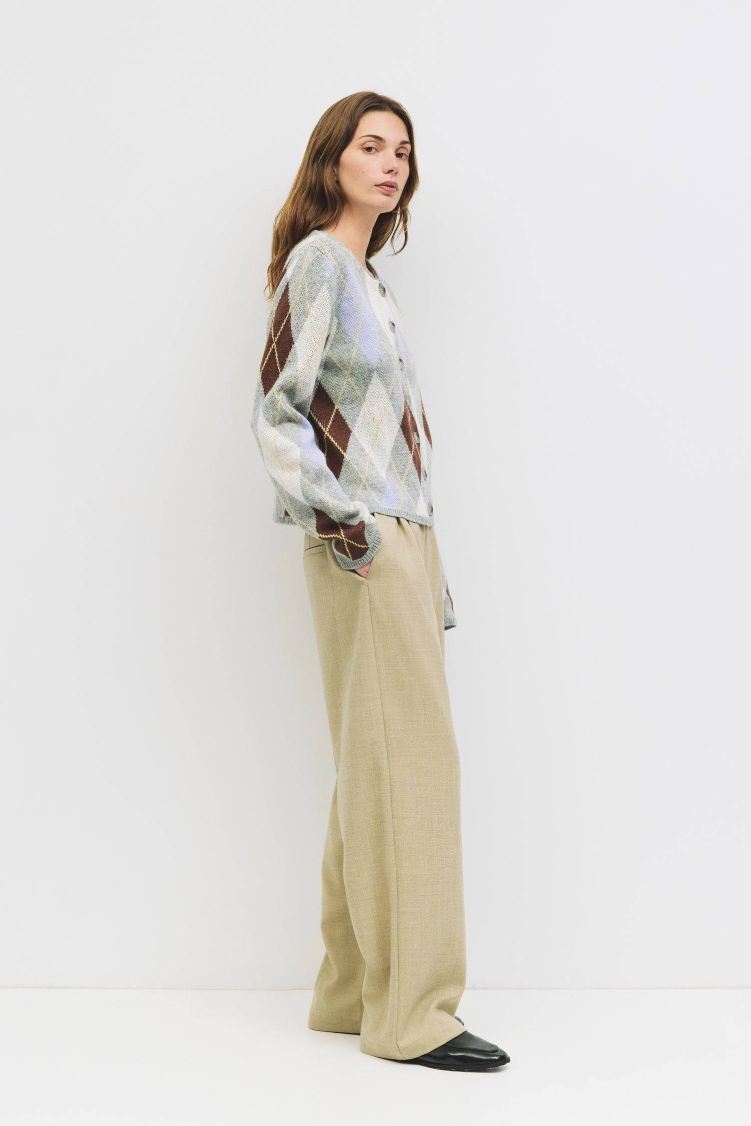 9084469608669, The Gayle Cardigan, Outerwear, Mod Ref, Acrylic,Cardigan,Casual,cf-color-grey,cf-color-sage,cf-size-l,cf-size-m,cf-size-s,cf-size-xl,cf-size-xs,cf-vendor-mod-ref,crewneck,Everyday,fall,Grey,Heather Grey,Long Sleeve,Mod Ref,modref,new,Pullover,Relaxed,Relaxed Fit,Sweater,Transitional,Women's,Wool,wool blend, Information The Gayle Cardigan is a relaxed-fit knit featuring a classic argyle design. It has a crewneck, long sleeves, and a front button closure. Made from midweight knit, it’s a timele