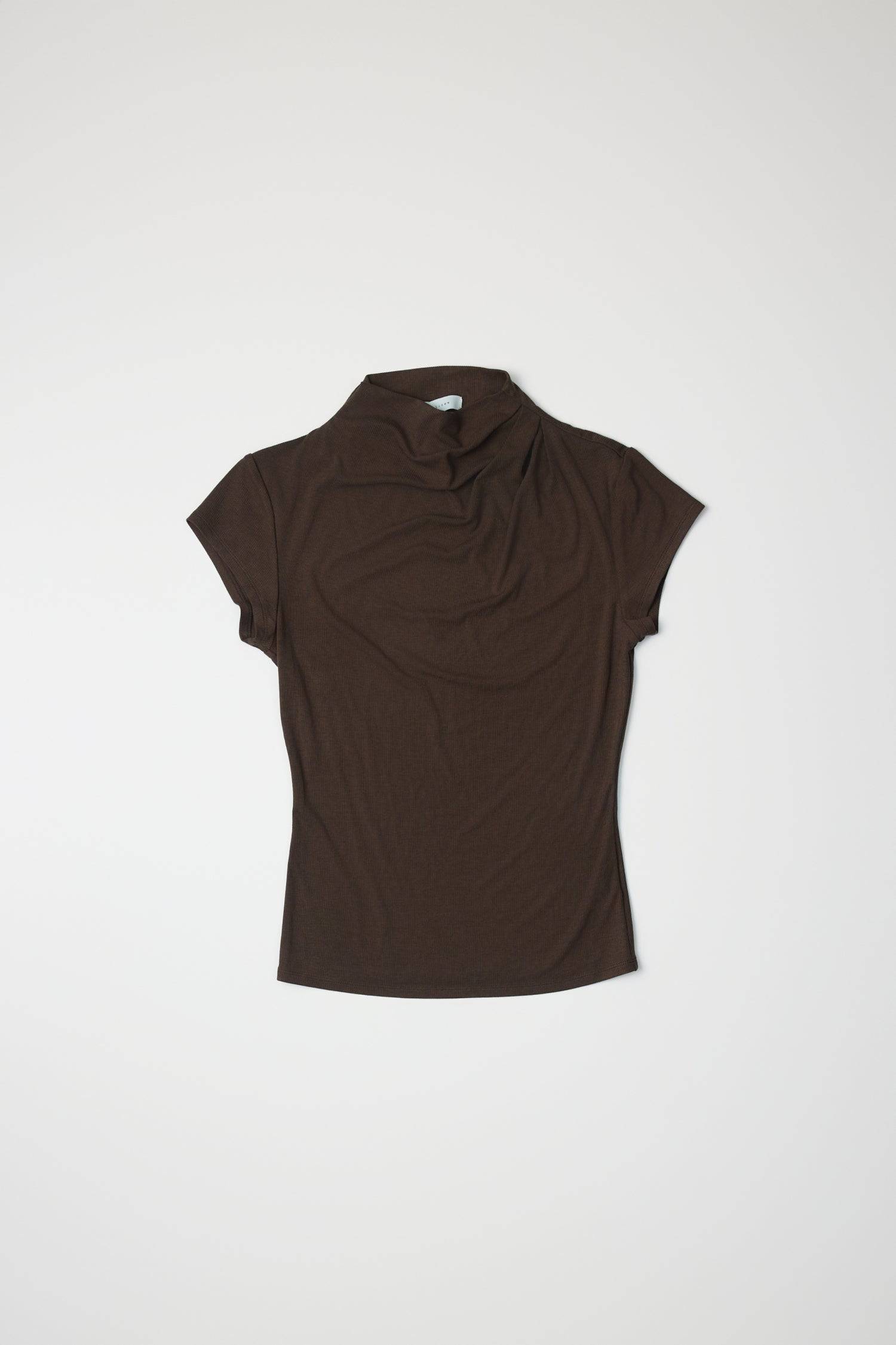 8994170470621, The Marissa Top, Tops, All Row, Cap Sleeve,Comfort,Comfortable,Cowl,cowl neck,Feminine,Form Fitting,Mock neck,new,Ribbed,Ribbed Fabric,Ribbed Top,Short Sleeve,Spring,Tops,versatile,white,Womens,womens top, Information The Marissa Top is a form-fitting ribbed knit top that features a mock cowl neck and subtle shoulder pleating for added texture. With cap sleeves and a sleek silhouette, it offers a modern, refined look. Details Self: 50% Modal, 35% Acrylic, 8% Wool, 7% Spandex Form Fitting Mock