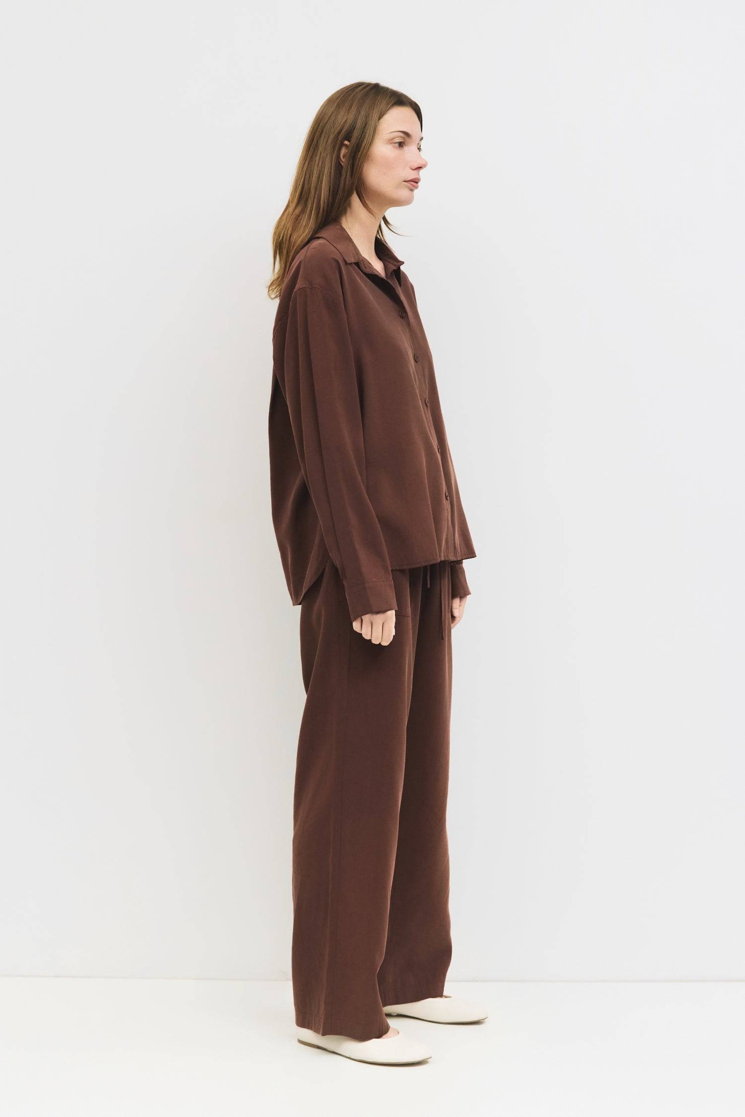 9084434645213, The Ellis Top, Tops, All Row, All Row,allrow,Blue,brown,Button Down Shirt,Casual,cf-color-blue,cf-color-brown,cf-size-l,cf-size-m,cf-size-s,cf-vendor-all-row,Chestnut Brown,Light Blue,Long Sleeve Top,Matching Set,modal,new,Relaxed,Relaxed Fit,set,Sets,Spring,thin,Women's,womens top, Information The Ellis Top is a relaxed-fit, lightweight button-up crafted for everyday ease. Pair it with The Ellis Pants for a comfortable monochromatic look. Details 80% Rayon, 20% Polyester Relaxed Fit Front Bu