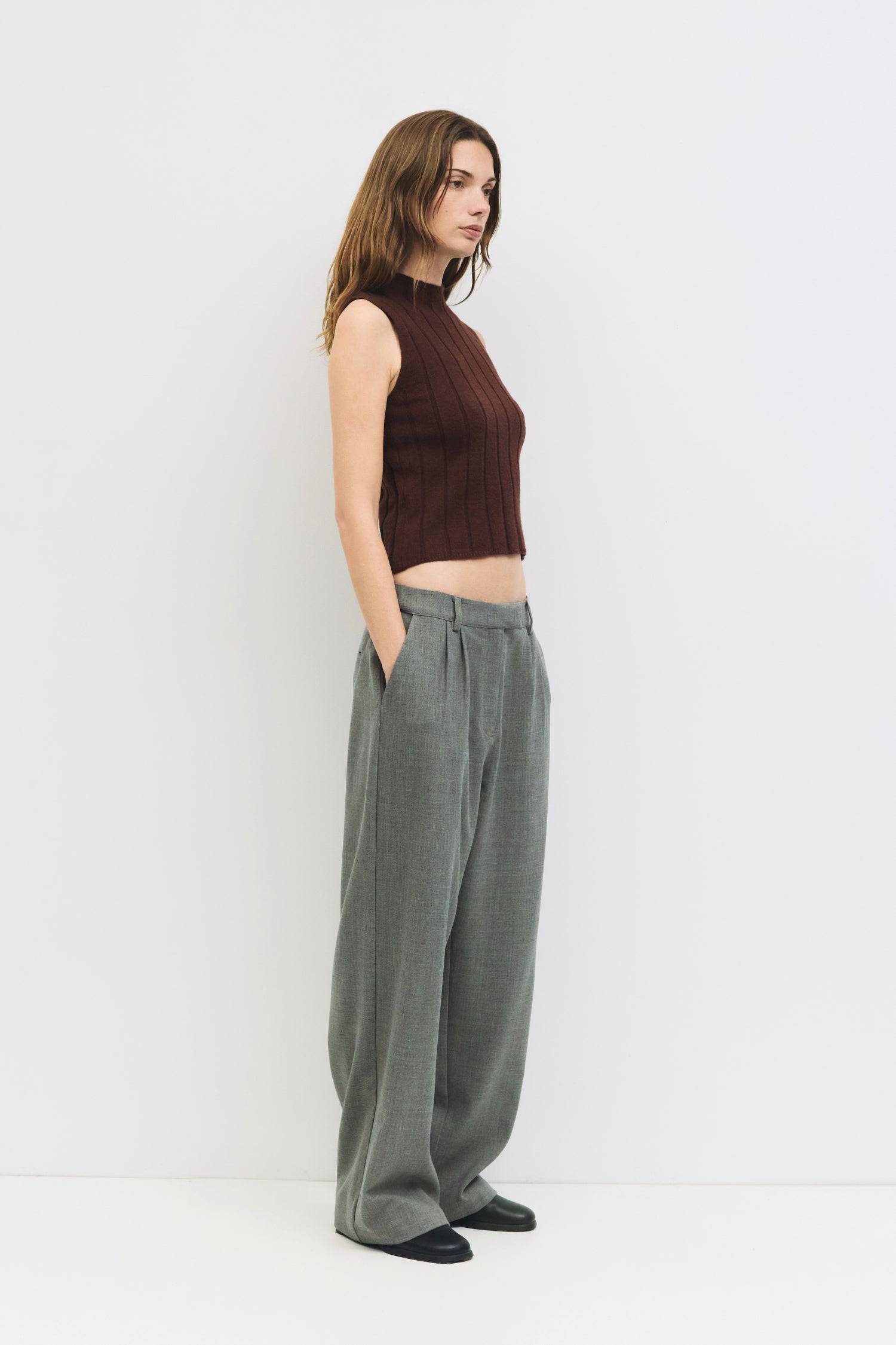 9084429304029, The Lorenza Top, Tops, All Row, Acrylic,All Row,allrow,beige,Black,Casual,cf-color-white,cf-size-l,cf-size-m,cf-size-s,cf-vendor-all-row,Comfortable,Cozy,Cropped,cropped hemline,Form Fitting,knit,Knit Top,Knitted Top,Minimal,Mock neck,new,Ribbed,Ribbed Details,Ribbed Top,Sleeveless,Spring,Summer,tank,Tank Top,Women's,womens top, Information The Lorenza Top is a sleeveless, bodycon cropped knit with a sleek mock neck. Crafted from thick ribbed midweight fabric, it's a minimalist staple with a