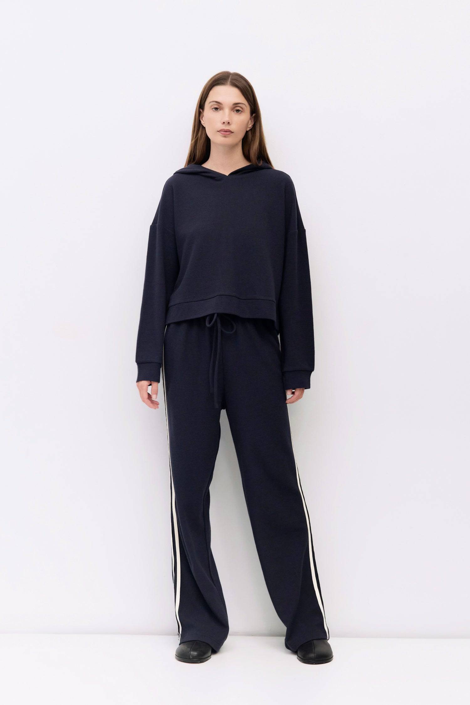 9084506472669, The Enzo Hoodie, Outerwear, All Row, All Row,allrow,Casual,cf-size-l,cf-size-m,cf-vendor-all-row,Cropped,cropped hemline,drop shoulder,Drop Shoulder Sleeve,Everyday,genderless,Hoodie,Minimal,minimalist,new,Outerwear,Polyester,Relaxed,Relaxed Fit,Ribbed,Ribbed Details,Ribbed Fabric,Spring,Sweater,Transitional,versatile,waffle knit,Womens,womens top, Information The Enzo Hoodie combines cozy midweight waffle knit with a relaxed fit and drop shoulders for effortless comfort. Finished with a hood