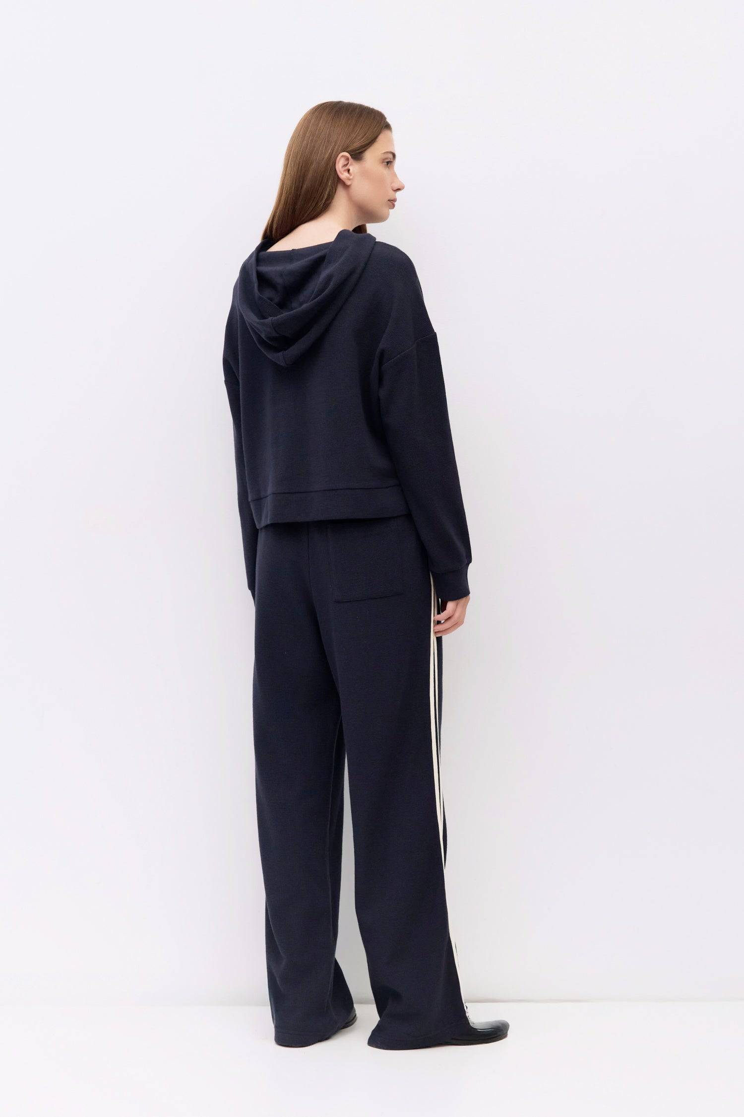 9084506472669, The Enzo Hoodie, Outerwear, All Row, All Row,allrow,Casual,cf-size-l,cf-size-m,cf-vendor-all-row,Cropped,cropped hemline,drop shoulder,Drop Shoulder Sleeve,Everyday,genderless,Hoodie,Minimal,minimalist,new,Outerwear,Polyester,Relaxed,Relaxed Fit,Ribbed,Ribbed Details,Ribbed Fabric,Spring,Sweater,Transitional,versatile,waffle knit,Womens,womens top, Information The Enzo Hoodie combines cozy midweight waffle knit with a relaxed fit and drop shoulders for effortless comfort. Finished with a hood