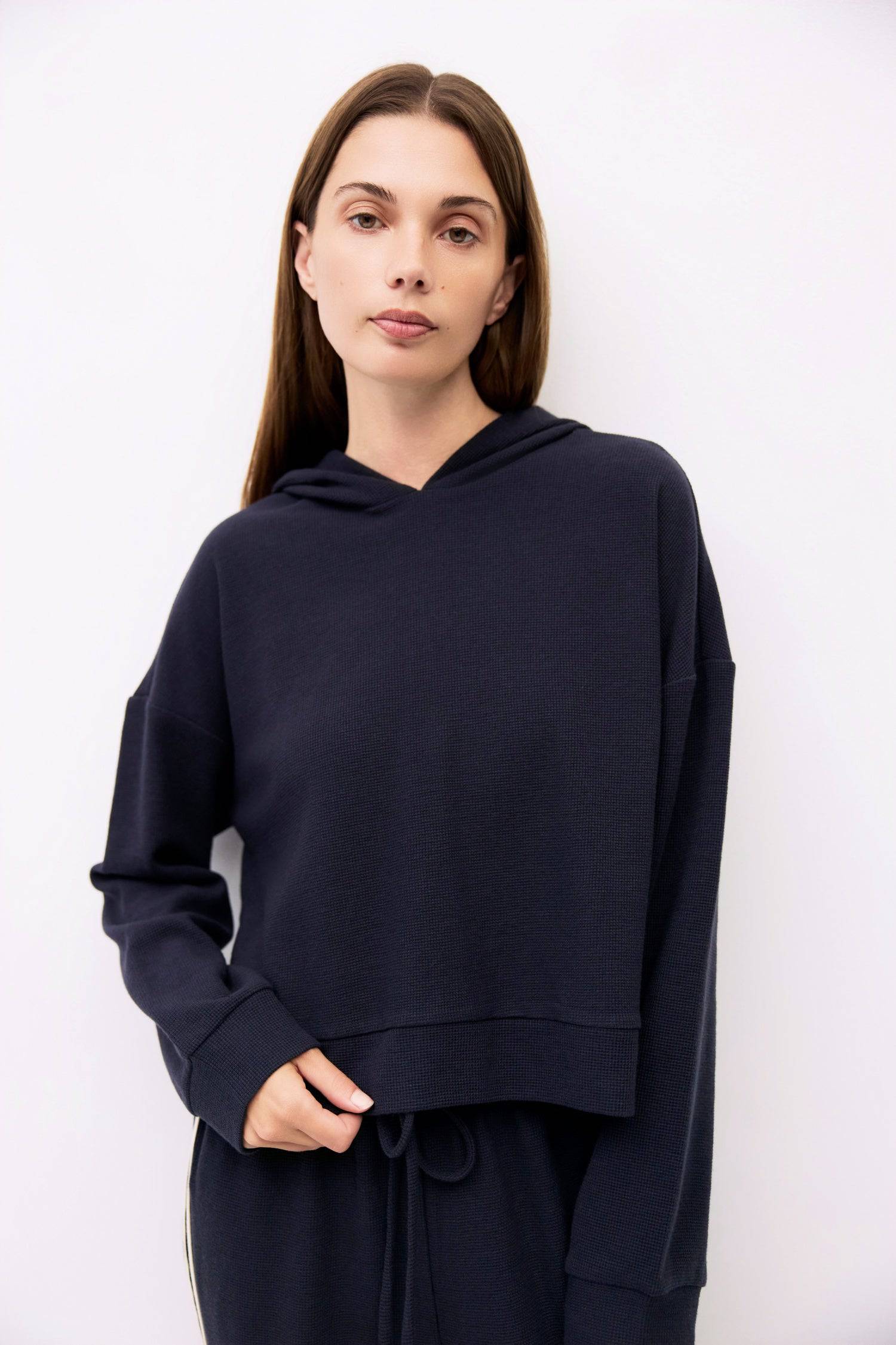 9084506472669, The Enzo Hoodie, Outerwear, All Row, All Row,allrow,Casual,cf-size-l,cf-size-m,cf-vendor-all-row,Cropped,cropped hemline,drop shoulder,Drop Shoulder Sleeve,Everyday,genderless,Hoodie,Minimal,minimalist,new,Outerwear,Polyester,Relaxed,Relaxed Fit,Ribbed,Ribbed Details,Ribbed Fabric,Spring,Sweater,Transitional,versatile,waffle knit,Womens,womens top, Information The Enzo Hoodie combines cozy midweight waffle knit with a relaxed fit and drop shoulders for effortless comfort. Finished with a hood