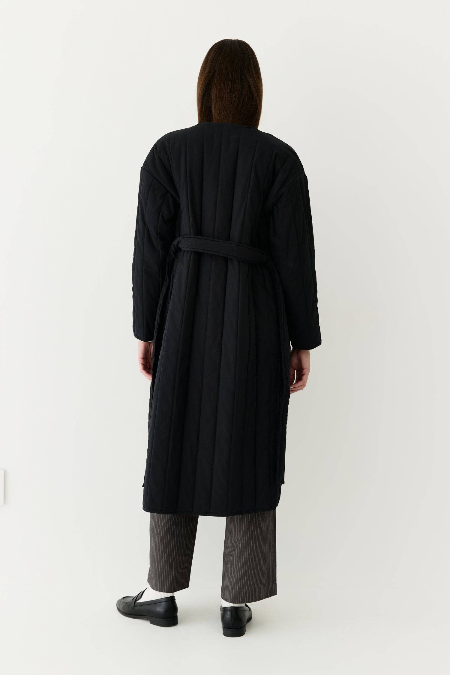 7964146401501, The Cary Coat, Outerwear, All Row, All Row,allrow,Back Detail,cf-color-black,cf-color-cream,cf-size-l,cf-size-m,cf-size-s,cf-vendor-all-row,Coat,Cotton,Cream,Detail,final-sale,finalsale,minimalist,new,Oversized,sale,statement,statement piece,tencel,Womens,womens top, Information Your winter wardrobe won't be complete without this long quilted coat. The Cary Coat is made in an oversized fit and features a classic rounded neckline, a button front closure, patch pockets, an easy below-the-knee l