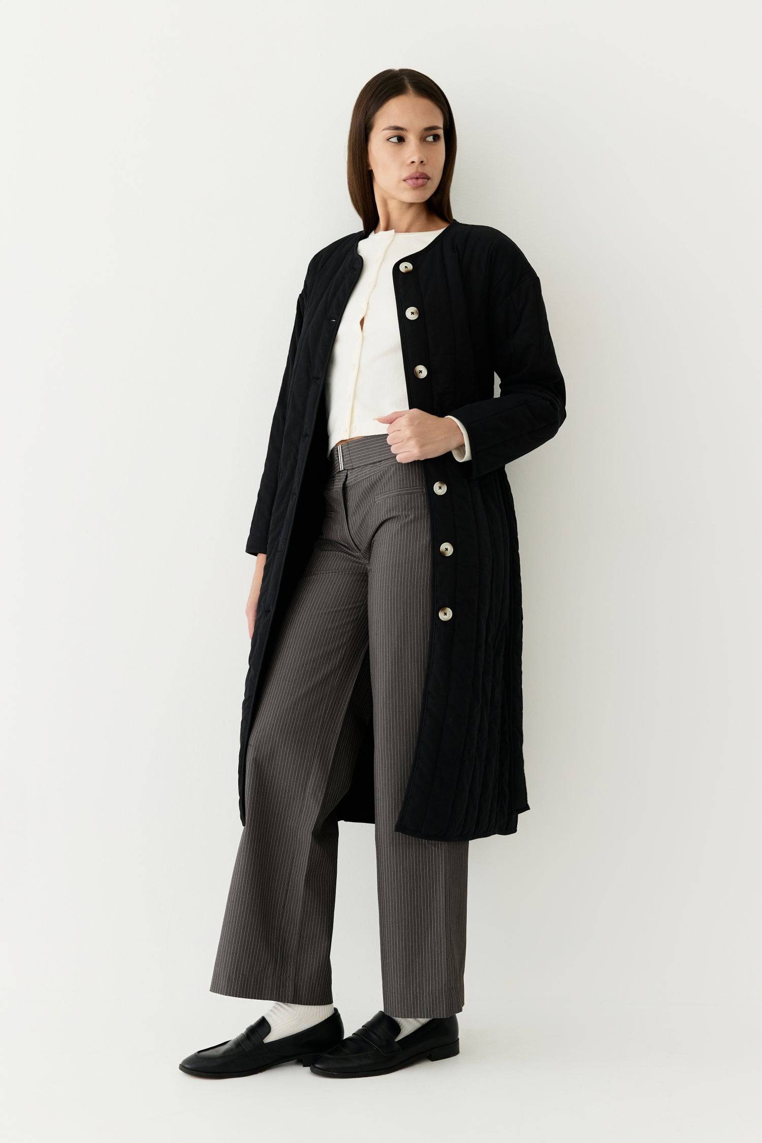 7964146401501, The Cary Coat, Outerwear, All Row, All Row,allrow,Back Detail,cf-color-black,cf-color-cream,cf-size-l,cf-size-m,cf-size-s,cf-vendor-all-row,Coat,Cotton,Cream,Detail,final-sale,finalsale,minimalist,new,Oversized,sale,statement,statement piece,tencel,Womens,womens top, Information Your winter wardrobe won't be complete without this long quilted coat. The Cary Coat is made in an oversized fit and features a classic rounded neckline, a button front closure, patch pockets, an easy below-the-knee l