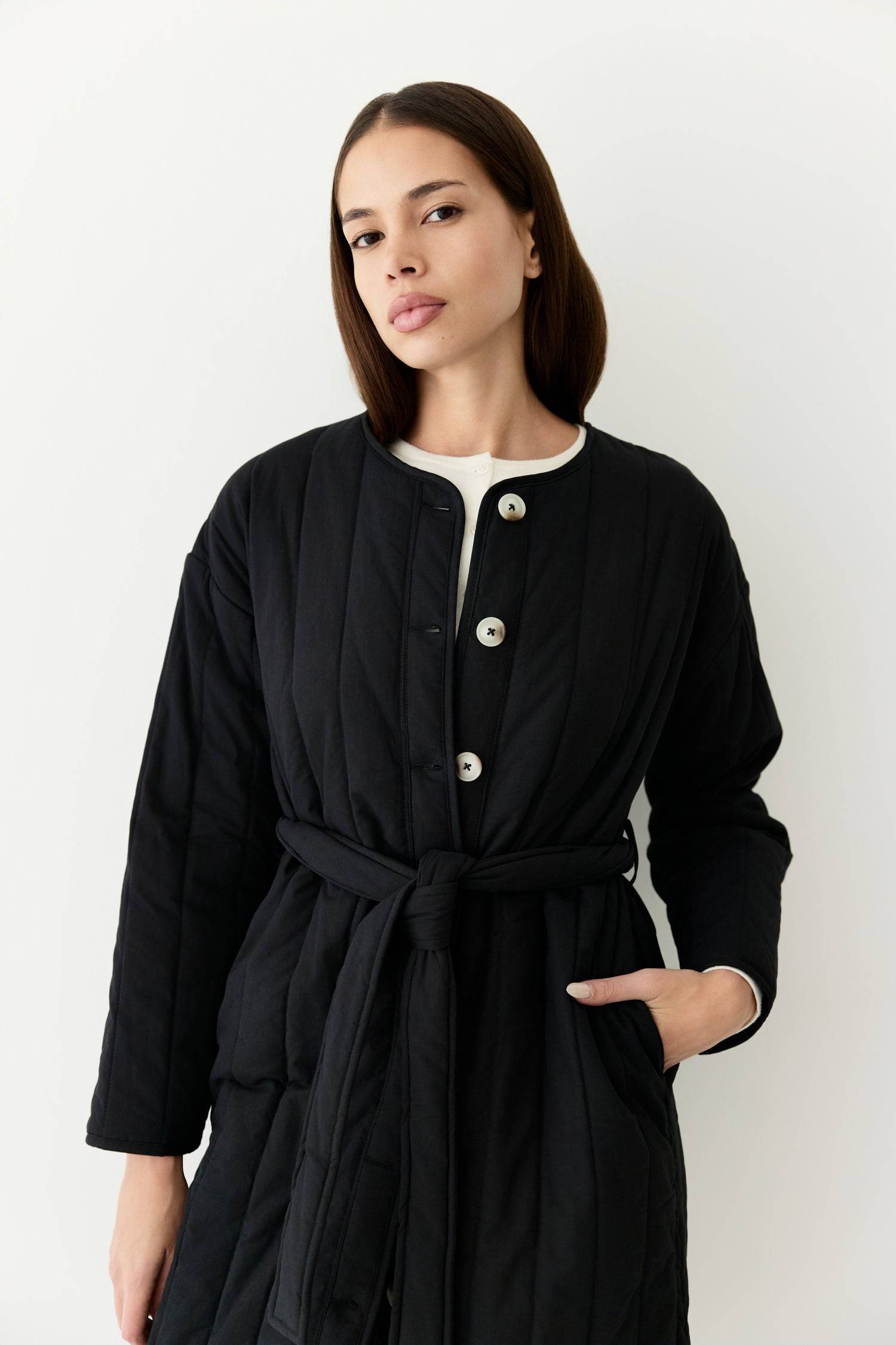 7964146401501, The Cary Coat, Outerwear, All Row, All Row,allrow,Back Detail,cf-color-black,cf-color-cream,cf-size-l,cf-size-m,cf-size-s,cf-vendor-all-row,Coat,Cotton,Cream,Detail,final-sale,finalsale,minimalist,new,Oversized,sale,statement,statement piece,tencel,Womens,womens top, Information Your winter wardrobe won't be complete without this long quilted coat. The Cary Coat is made in an oversized fit and features a classic rounded neckline, a button front closure, patch pockets, an easy below-the-knee l