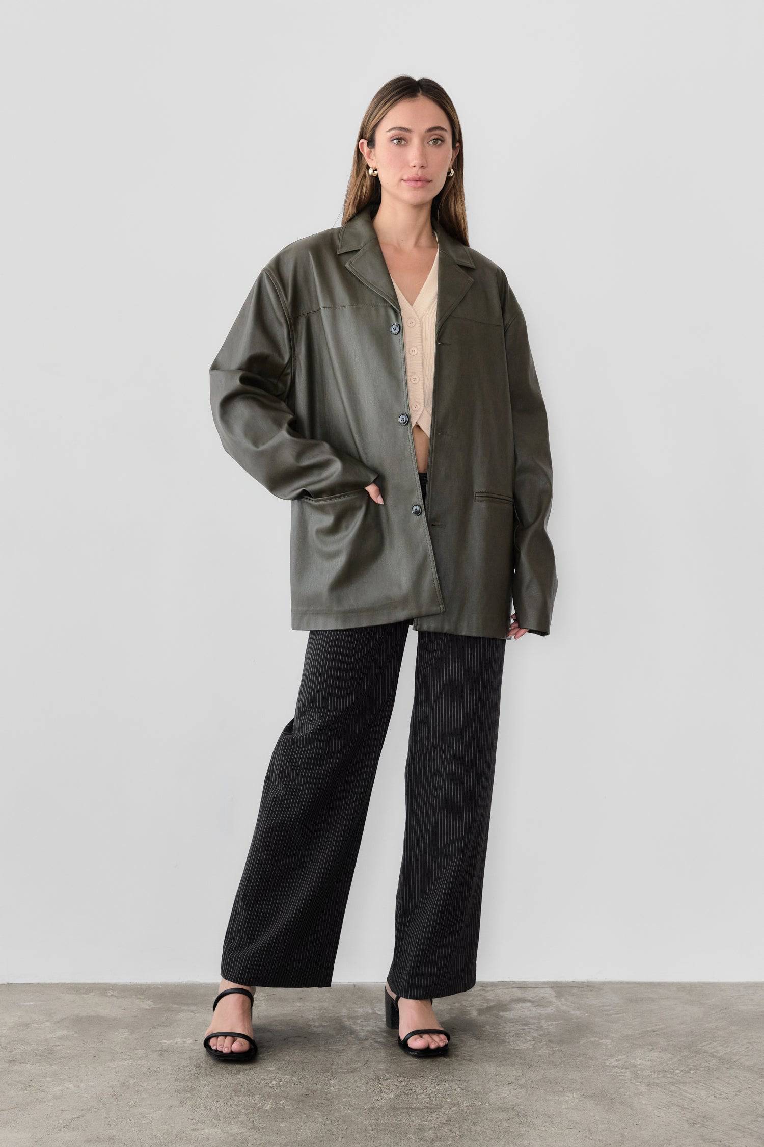 7964139290845, The Camren Jacket, Outerwear, All Row, All Row,allrow,Back Detail,cf-color-black,cf-color-olive,cf-size-l,cf-vendor-all-row,Coat,common,common market,Cotton,Detail,Faux Leather,genderless,Leather,mens,mens shirt,minimalist,new,Olive,Oversized,Pleather,Polyester,Semi-Formal,Spring,statement,statement piece,tencel,Unisex,vegan leather,versatile,Womens,womens top, Information The Camren Jacket is a unisex faux leather jacket in a boxy silhouette. It features a back yoke, side patch pockets, and