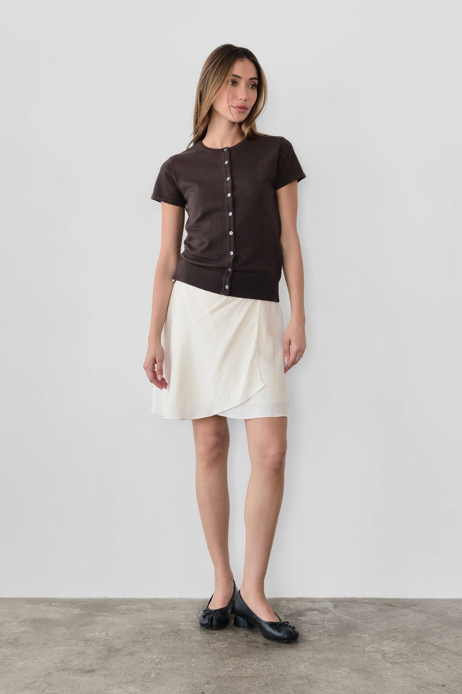 8477585080541, The Pauline Top, Tops, All Row, All Row,allrow,brown,Casual,cf-color-brown,cf-color-heather-grey,cf-color-ivory,Charcoal,Cozy,Heather Grey,ivory,knit,Knit Top,new,Short Sleeve,spring,straight-cut,Sweater Top,texture,thin,Vest,Vest Top,Women's,womens top, Information The Pauline Top is a timeless must-have for any wardrobe. It is a classic knit button-down top with dainty tonal buttons. With its fitted bodice and short-sleeve design, it offers a flattering silhouette. Versatile in wear, this t