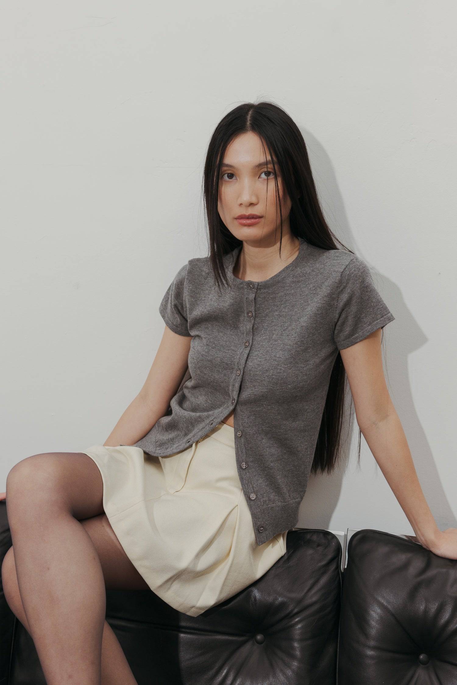 8477585080541, The Pauline Top, Tops, All Row, All Row,allrow,brown,Casual,cf-color-brown,cf-color-heather-grey,cf-color-ivory,Charcoal,Cozy,Heather Grey,ivory,knit,Knit Top,new,Short Sleeve,spring,straight-cut,Sweater Top,texture,thin,Vest,Vest Top,Women's,womens top, Information The Pauline Top is a timeless must-have for any wardrobe. It is a classic knit button-down top with dainty tonal buttons. With its fitted bodice and short-sleeve design, it offers a flattering silhouette. Versatile in wear, this t