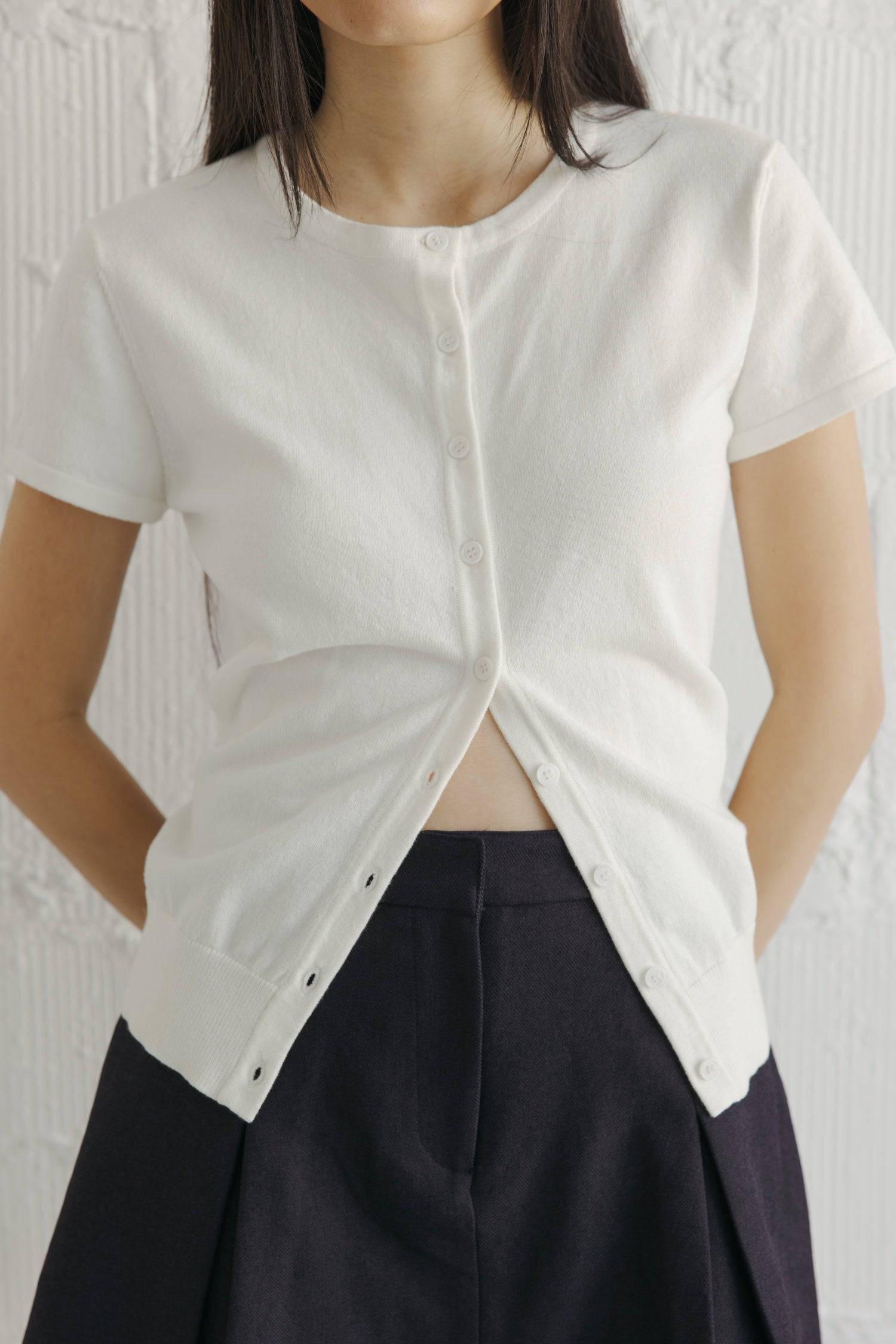 8477585080541, The Pauline Top, Tops, All Row, All Row,allrow,brown,Casual,cf-color-brown,cf-color-heather-grey,cf-color-ivory,Charcoal,Cozy,Heather Grey,ivory,knit,Knit Top,new,Short Sleeve,spring,straight-cut,Sweater Top,texture,thin,Vest,Vest Top,Women's,womens top, Information The Pauline Top is a timeless must-have for any wardrobe. It is a classic knit button-down top with dainty tonal buttons. With its fitted bodice and short-sleeve design, it offers a flattering silhouette. Versatile in wear, this t