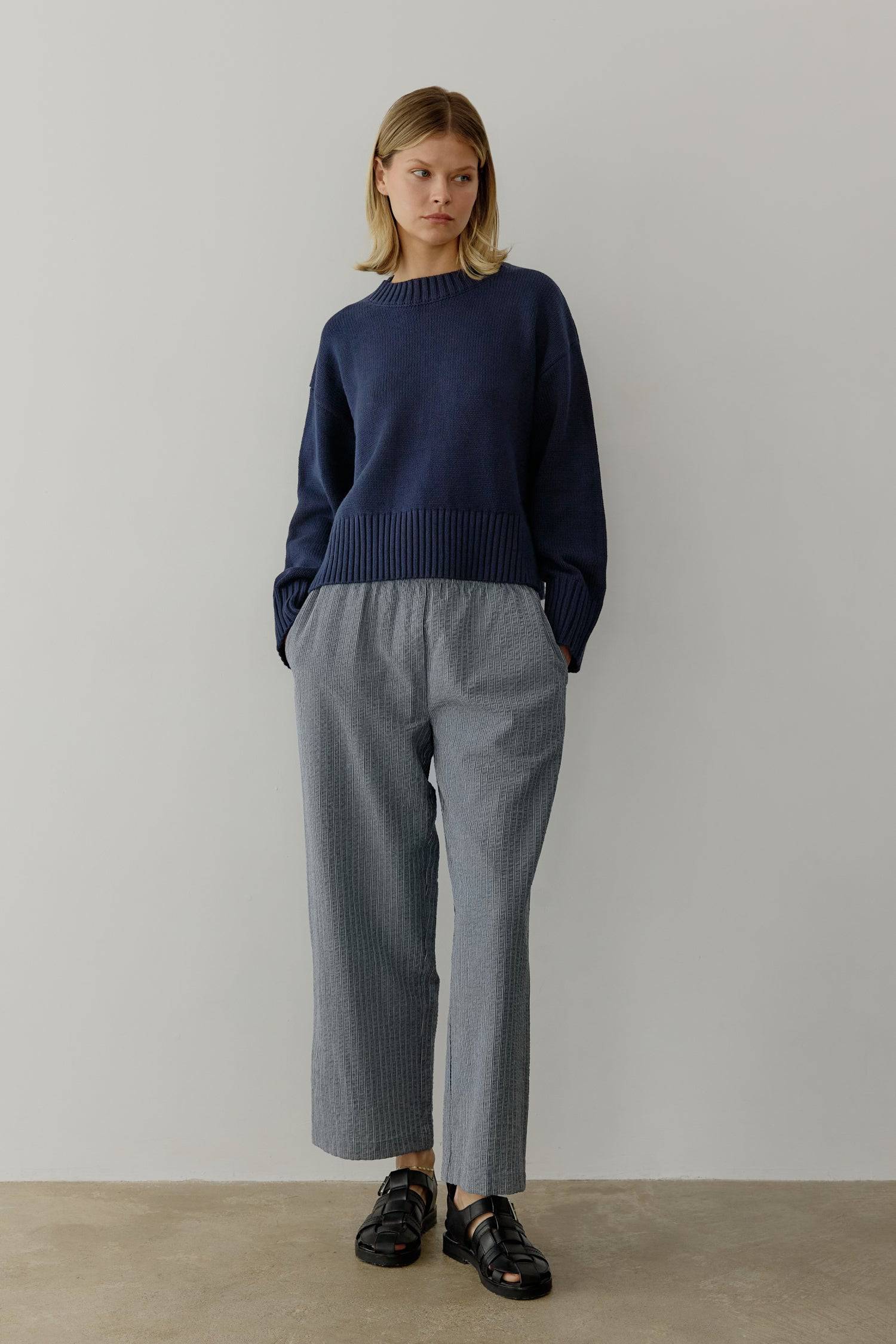 8809536323805, The Asher Sweater, Tops, All Row, All Row,allrow,Black,brown,Button Down Shirt,Button up,buttons,Cardigan,cf-color-black,cf-color-brown,cf-size-l,cf-size-m,cf-size-s,Comfortable,Crew Neck,Crew Neckline,Everyday,longsleeve,Matching Set,set,Sets,stretch,Stretchy,taupe,tonal buttons,Transitional,Womens,womens top, Information The Asher Sweater is an oversized cropped pullover sweater with a classic rib detail at the neckline and hem. The semi-cropped length ensures a proportional fit and the mid