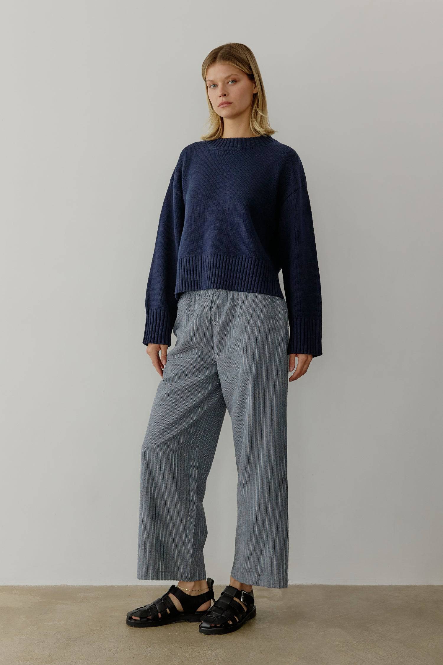 8809536323805, The Asher Sweater, Tops, All Row, All Row,allrow,Black,brown,Button Down Shirt,Button up,buttons,Cardigan,cf-color-black,cf-color-brown,cf-size-l,cf-size-m,cf-size-s,Comfortable,Crew Neck,Crew Neckline,Everyday,longsleeve,Matching Set,set,Sets,stretch,Stretchy,taupe,tonal buttons,Transitional,Womens,womens top, Information The Asher Sweater is an oversized cropped pullover sweater with a classic rib detail at the neckline and hem. The semi-cropped length ensures a proportional fit and the mid