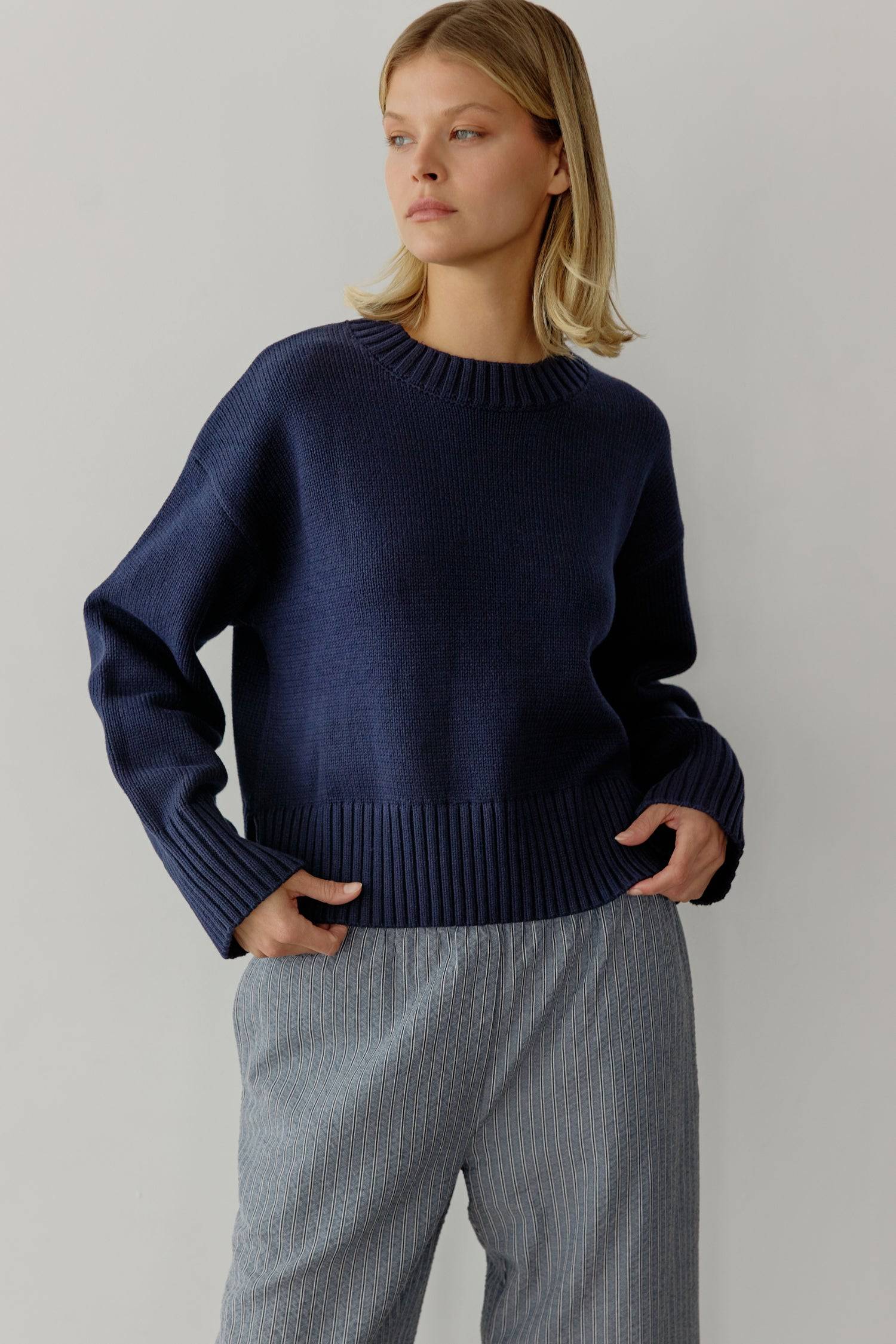 8809536323805, The Asher Sweater, Tops, All Row, All Row,allrow,Black,brown,Button Down Shirt,Button up,buttons,Cardigan,cf-color-black,cf-color-brown,cf-size-l,cf-size-m,cf-size-s,Comfortable,Crew Neck,Crew Neckline,Everyday,longsleeve,Matching Set,set,Sets,stretch,Stretchy,taupe,tonal buttons,Transitional,Womens,womens top, Information The Asher Sweater is an oversized cropped pullover sweater with a classic rib detail at the neckline and hem. The semi-cropped length ensures a proportional fit and the mid