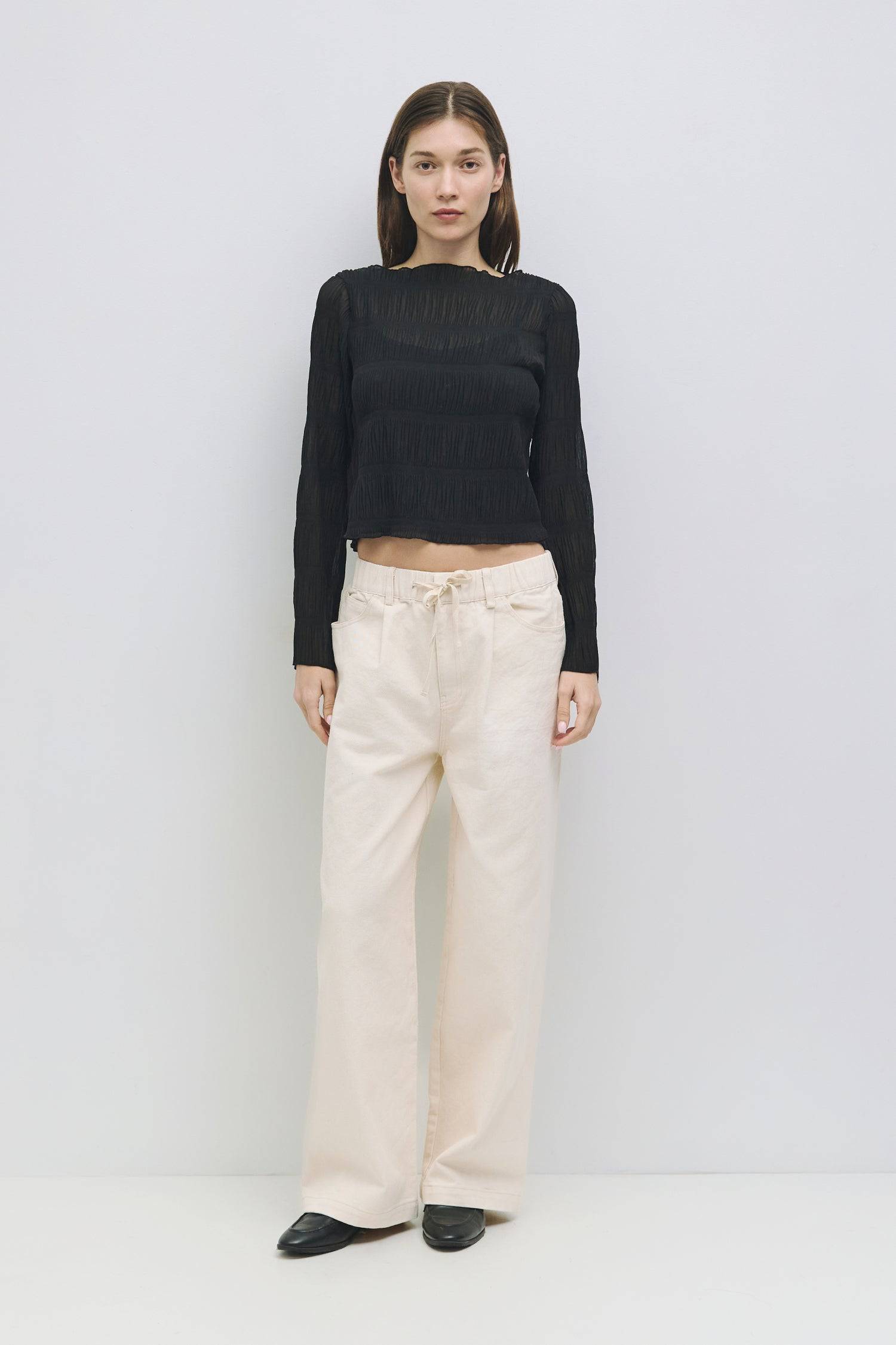 8878015054045, The Runa Top, Tops, All Row, Basic,Basics,Black,Breathable,brown,Casual,cf-color-brown,cf-size-l,cf-size-m,cf-size-s,cf-vendor-all-row,Charcoal,Comfort,Comfortable,Cream,crinkle,crinkle texture,Crinkled Fabric,Feminine,Long Sleeve,Long Sleeve Shirt,Long Sleeve Top,long sleeves,longsleeve,new,Relaxed Fit,semi cropped,top,womens, Information The Runa Top is a crinkled wide-sleeve top that features a relaxed fit and a semi-cropped length for a contemporary look. The included inner slip ensures a