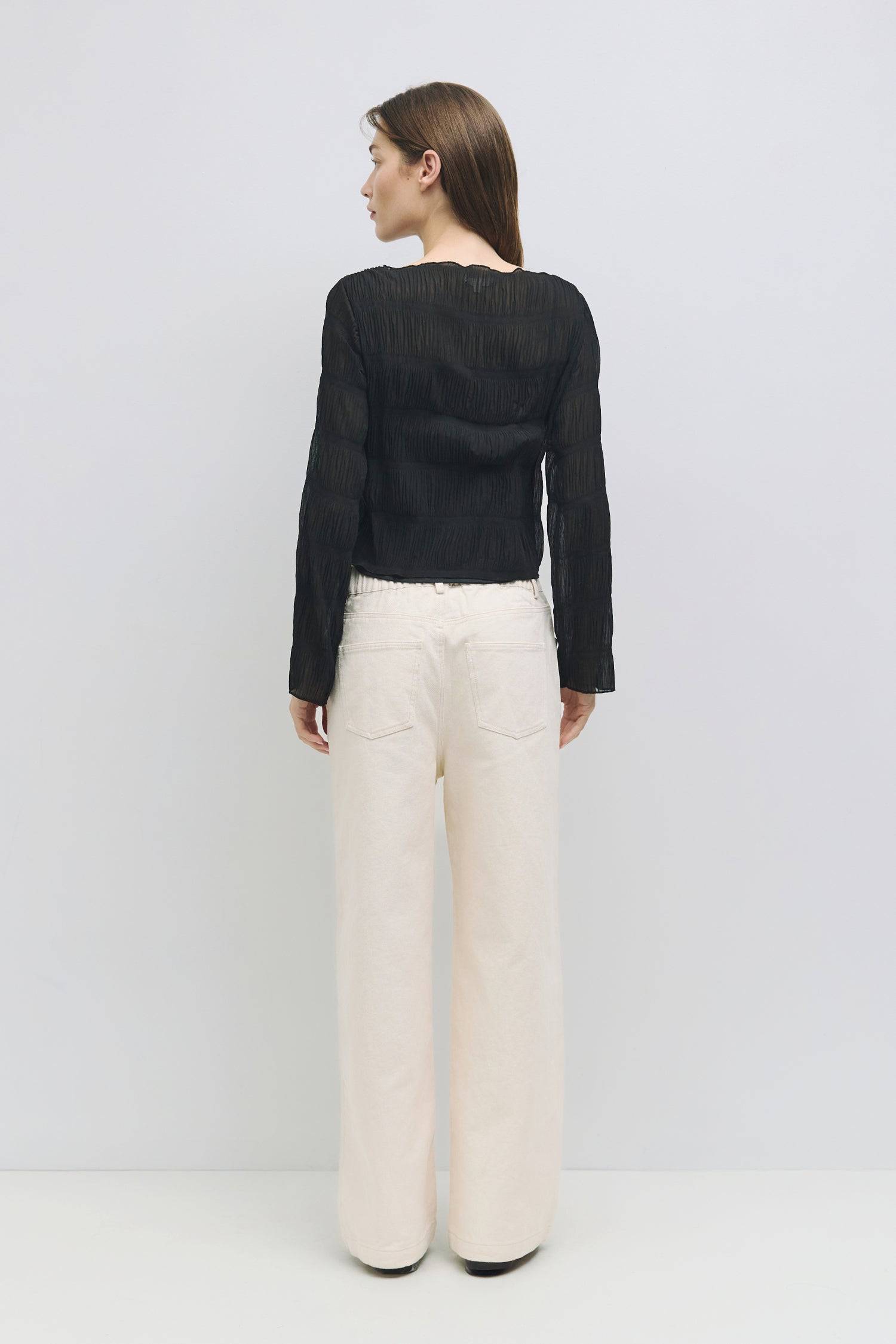 8878015054045, The Runa Top, Tops, All Row, Basic,Basics,Black,Breathable,brown,Casual,cf-color-brown,cf-size-l,cf-size-m,cf-size-s,cf-vendor-all-row,Charcoal,Comfort,Comfortable,Cream,crinkle,crinkle texture,Crinkled Fabric,Feminine,Long Sleeve,Long Sleeve Shirt,Long Sleeve Top,long sleeves,longsleeve,new,Relaxed Fit,semi cropped,top,womens, Information The Runa Top is a crinkled wide-sleeve top that features a relaxed fit and a semi-cropped length for a contemporary look. The included inner slip ensures a