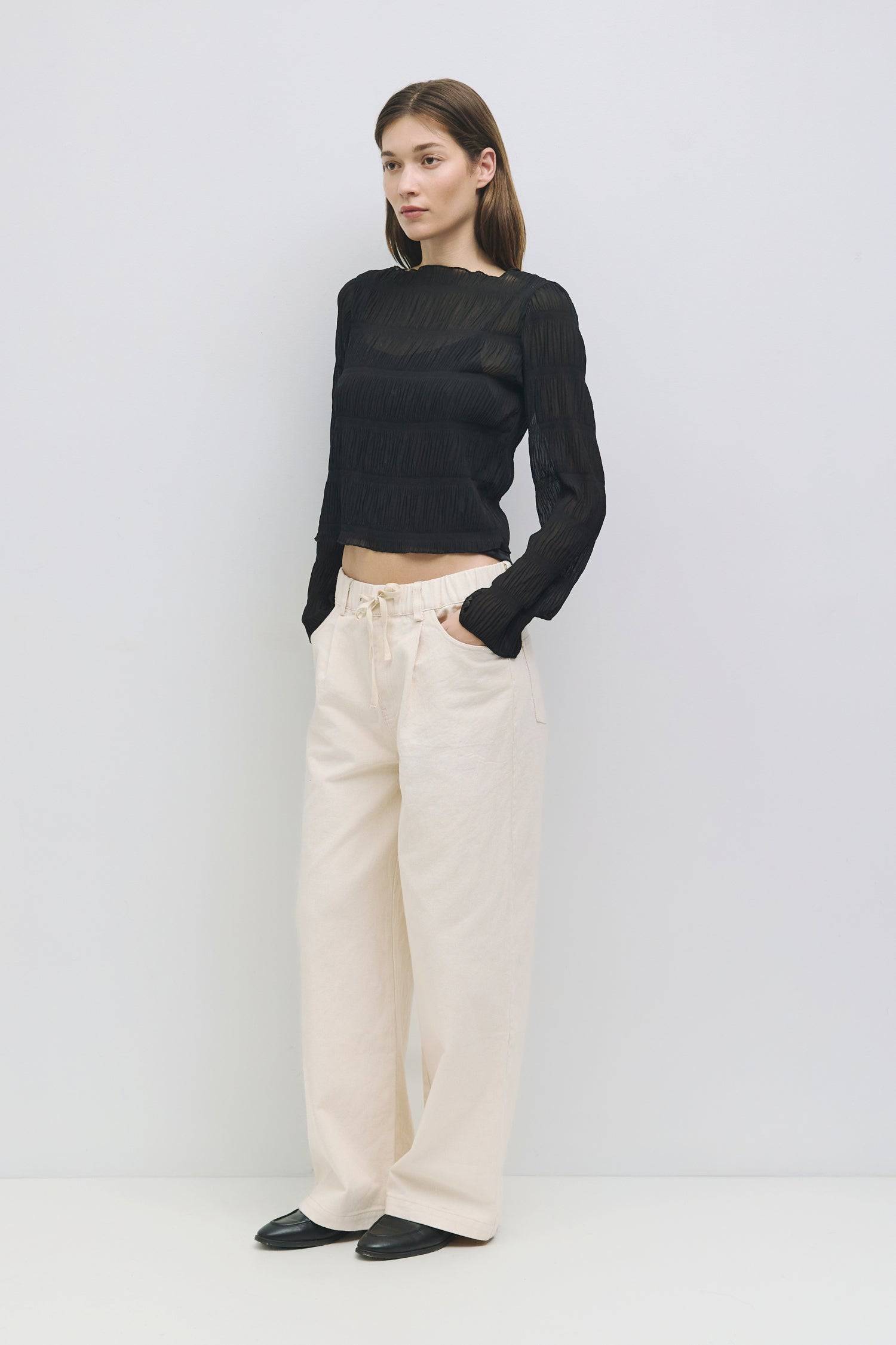 8878015054045, The Runa Top, Tops, All Row, Basic,Basics,Black,Breathable,brown,Casual,cf-color-brown,cf-size-l,cf-size-m,cf-size-s,cf-vendor-all-row,Charcoal,Comfort,Comfortable,Cream,crinkle,crinkle texture,Crinkled Fabric,Feminine,Long Sleeve,Long Sleeve Shirt,Long Sleeve Top,long sleeves,longsleeve,new,Relaxed Fit,semi cropped,top,womens, Information The Runa Top is a crinkled wide-sleeve top that features a relaxed fit and a semi-cropped length for a contemporary look. The included inner slip ensures a