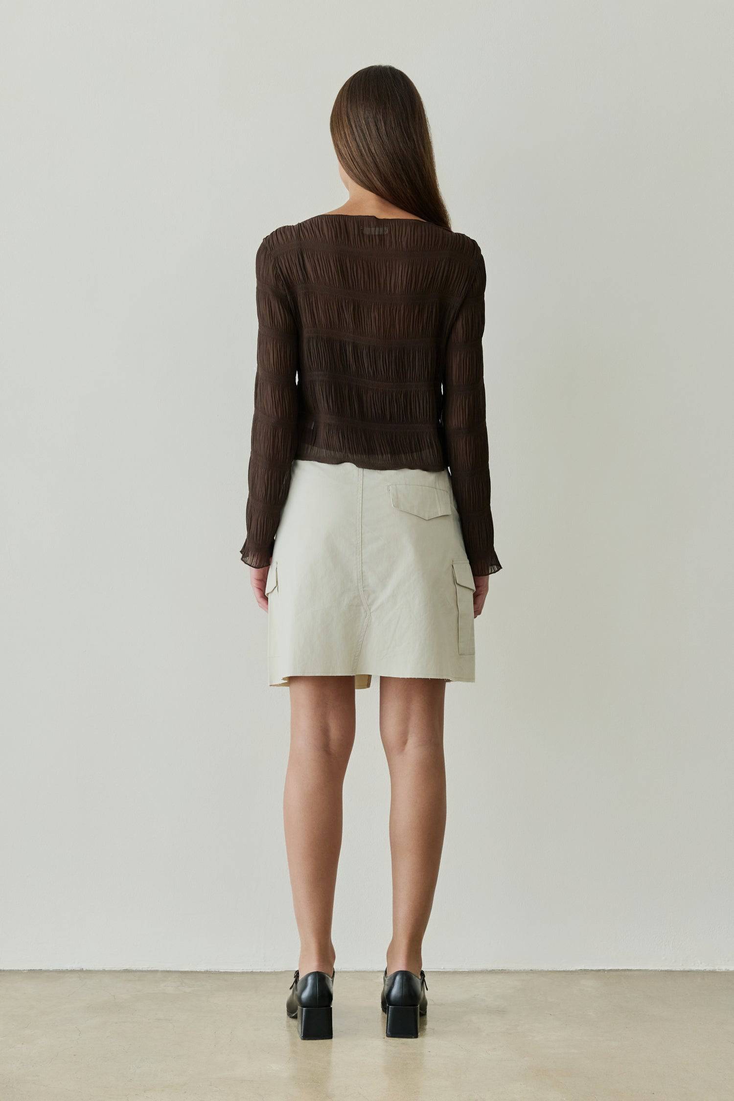 8878015054045, The Runa Top, Tops, All Row, Basic,Basics,Black,Breathable,brown,Casual,cf-color-brown,cf-size-l,cf-size-m,cf-size-s,cf-vendor-all-row,Charcoal,Comfort,Comfortable,Cream,crinkle,crinkle texture,Crinkled Fabric,Feminine,Long Sleeve,Long Sleeve Shirt,Long Sleeve Top,long sleeves,longsleeve,new,Relaxed Fit,semi cropped,top,womens, Information The Runa Top is a crinkled wide-sleeve top that features a relaxed fit and a semi-cropped length for a contemporary look. The included inner slip ensures a