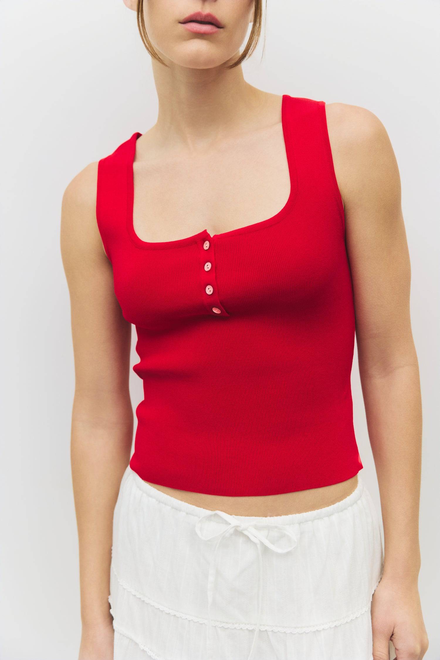 8929245593821, The Kerrigan Top, Tops, All Row, All Row,allrow,Basic,Basics,beige,Casual,cf-color-beige,cf-size-l,cf-size-m,cf-size-s,cf-vendor-all-row,Comfortable,Everyday,final-sale,finalsale,ivory,knit,Knit Top,Long Sleeve,Long Sleeve Top,Lounge,Loungewear,new,sale,Sleevless,Spring,Summer,tank,thin,Women's,womens top, Information The Kerrigan Top is a simple sleeveless tank featuring a square neckline and a partial button-down front for a touch of flair. Made from a soft ribbed knit fabric, this top is p