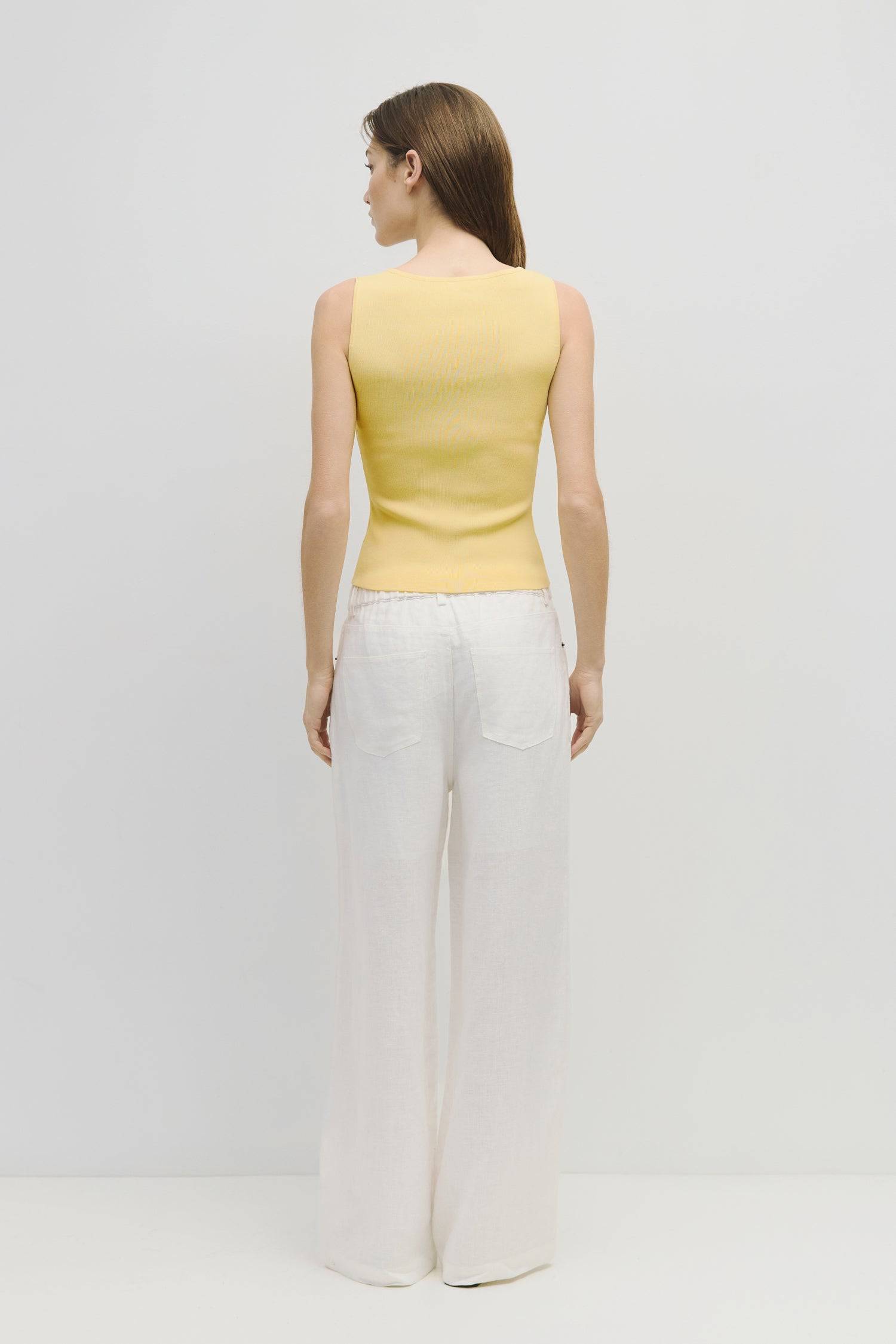 8929245593821, The Kerrigan Top, Tops, All Row, All Row,allrow,Basic,Basics,beige,Casual,cf-color-beige,cf-size-l,cf-size-m,cf-size-s,cf-vendor-all-row,Comfortable,Everyday,final-sale,finalsale,ivory,knit,Knit Top,Long Sleeve,Long Sleeve Top,Lounge,Loungewear,new,sale,Sleevless,Spring,Summer,tank,thin,Women's,womens top, Information The Kerrigan Top is a simple sleeveless tank featuring a square neckline and a partial button-down front for a touch of flair. Made from a soft ribbed knit fabric, this top is p